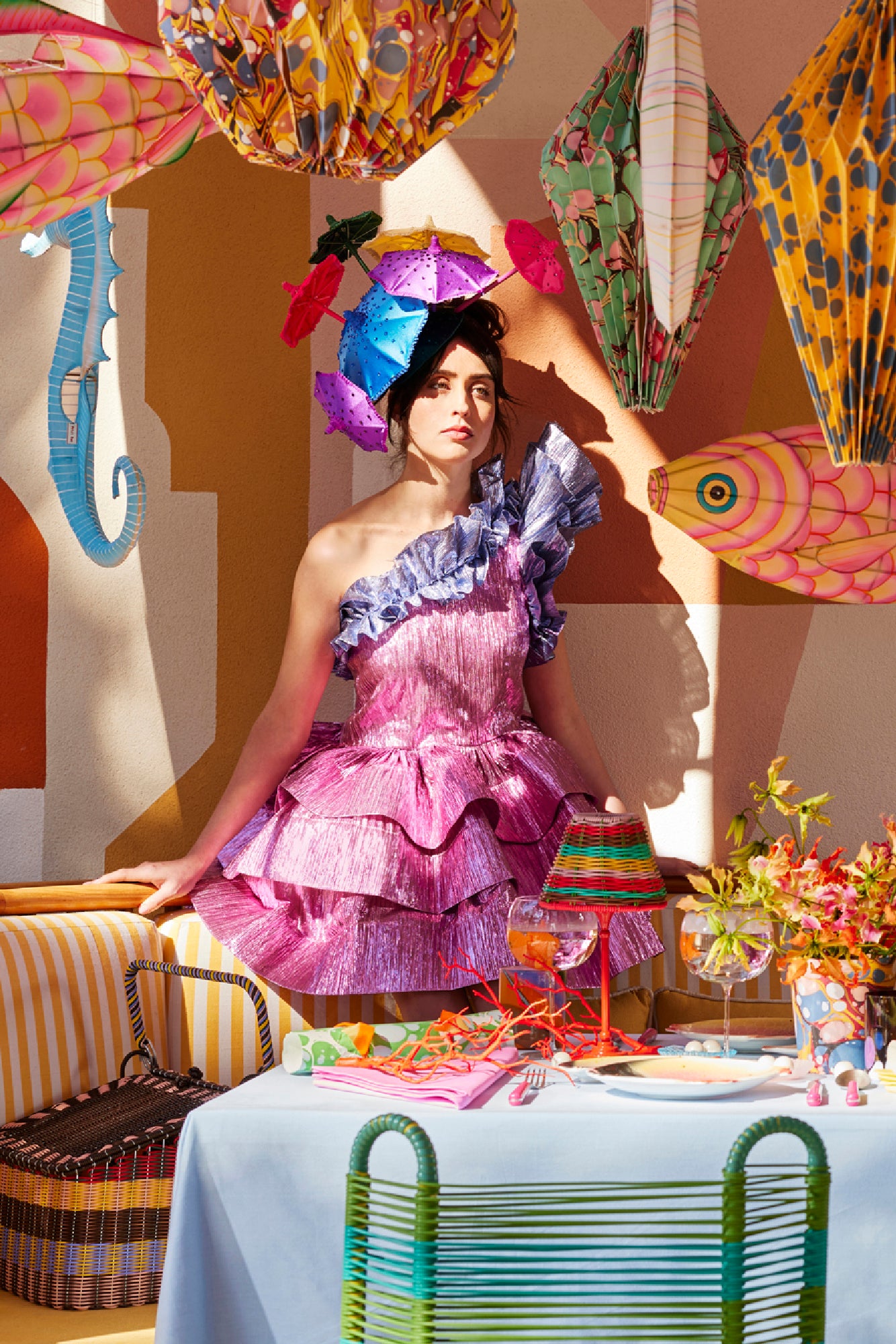 Show stopping colorful umbrella hat.