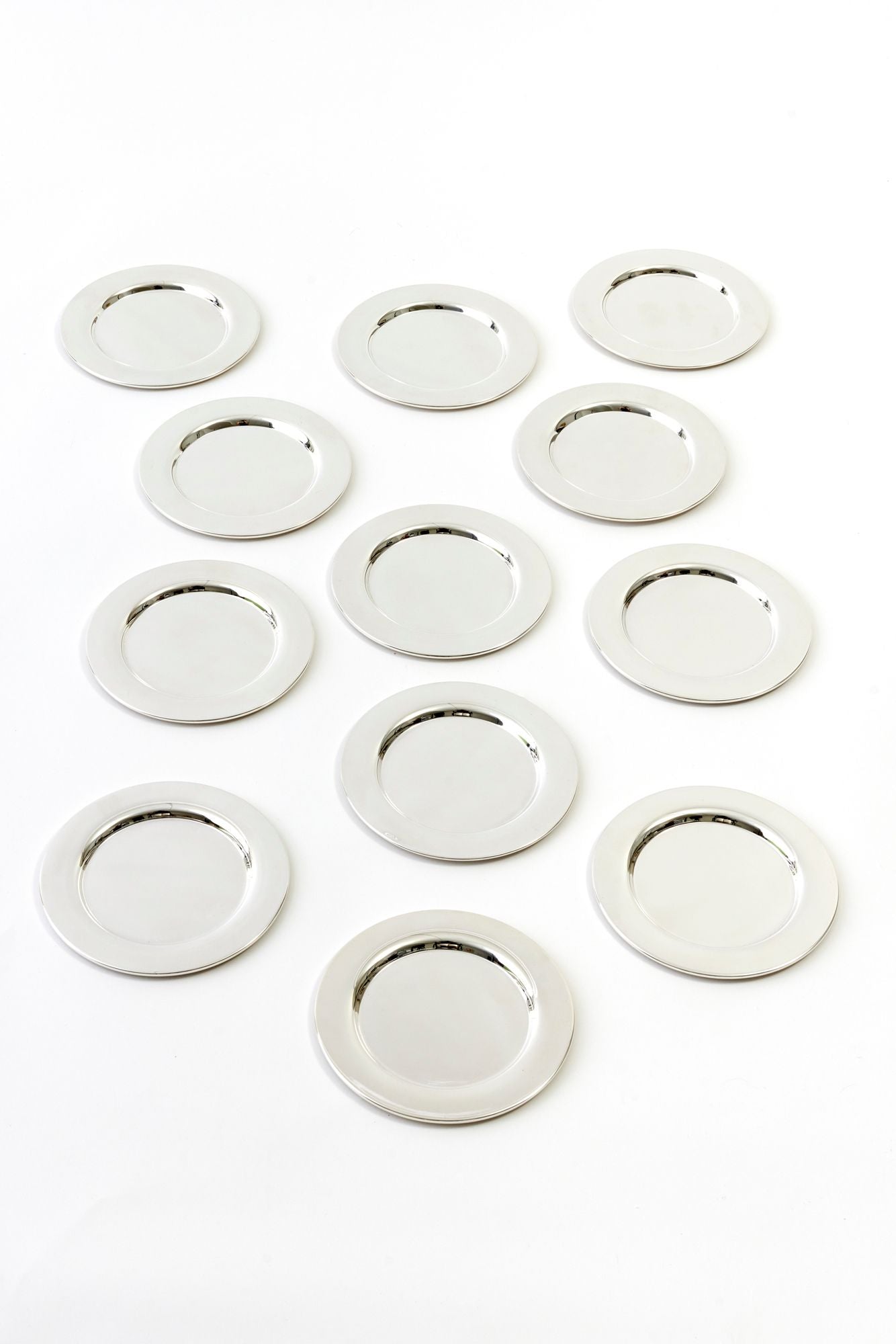 SET OF 12 VINTAGE ENGLISH SILVER COCKTAIL PLATES.