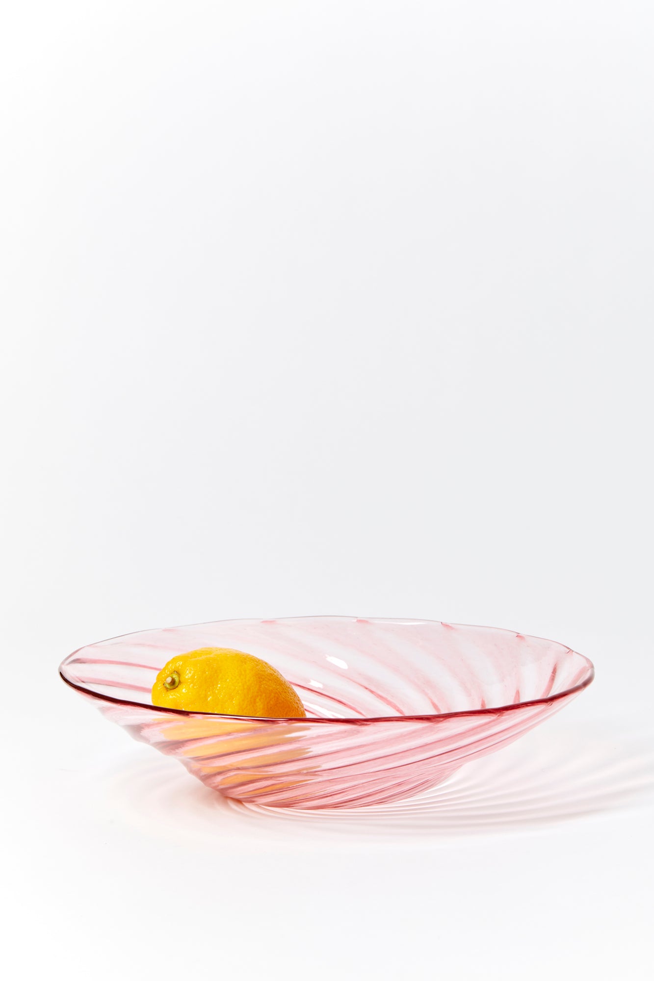 Handblown glass large bowls in variety of colors.