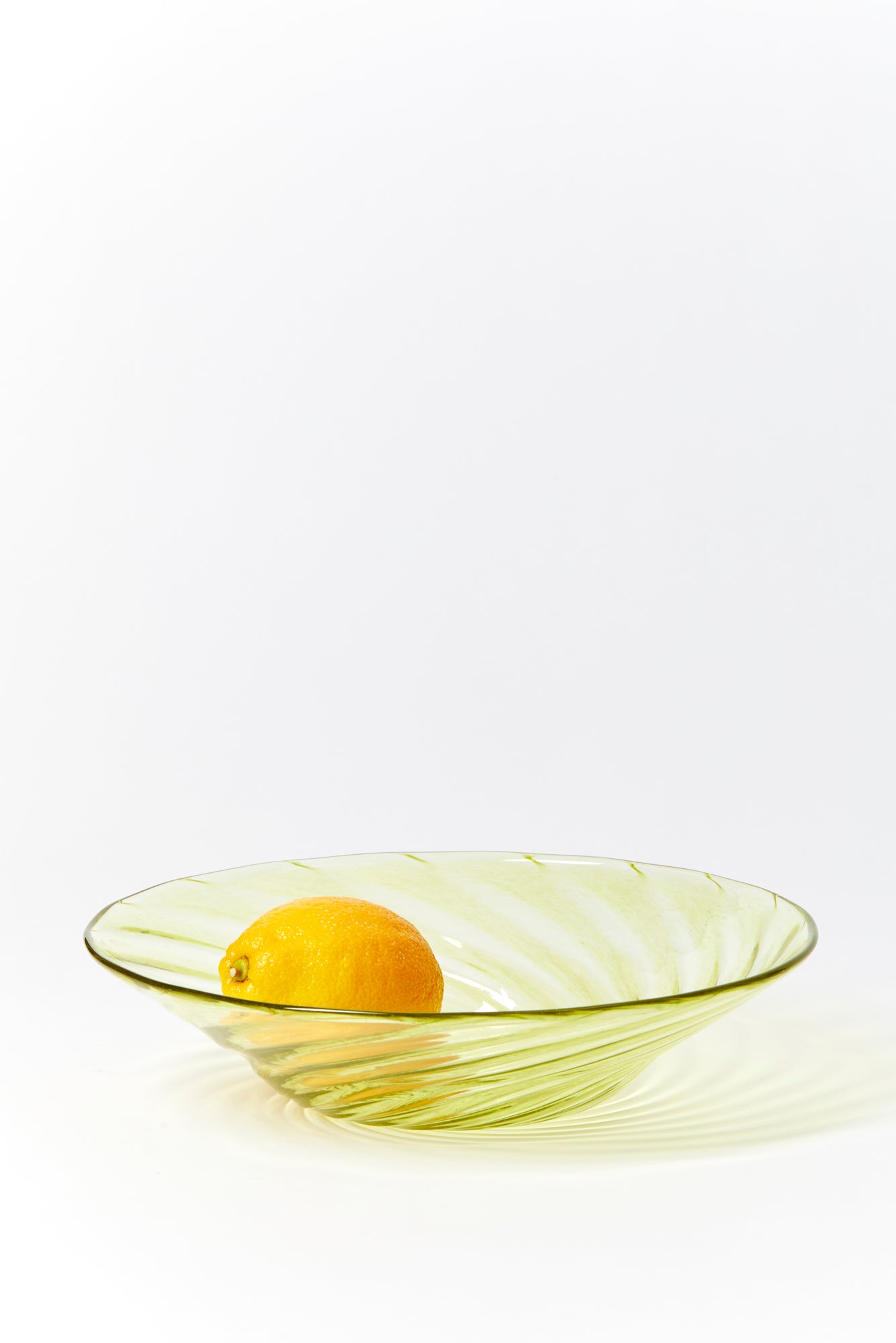 Handblown glass large bowls in variety of colors.