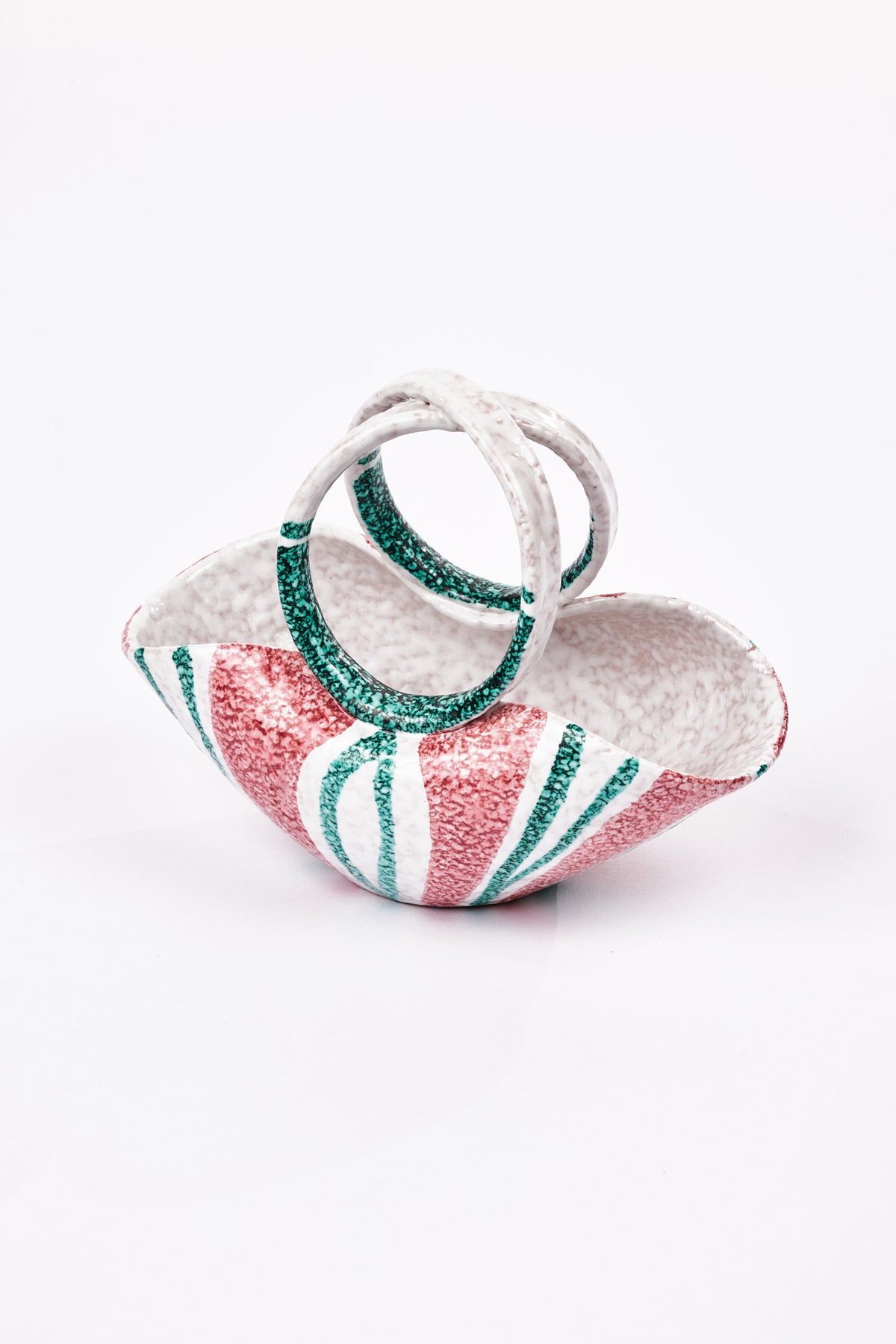 A small decorative purse vase with a textured finish, featuring a red and white striped exterior, a white interior, and two interlocking handles with green glitter trim, set against a plain white background.