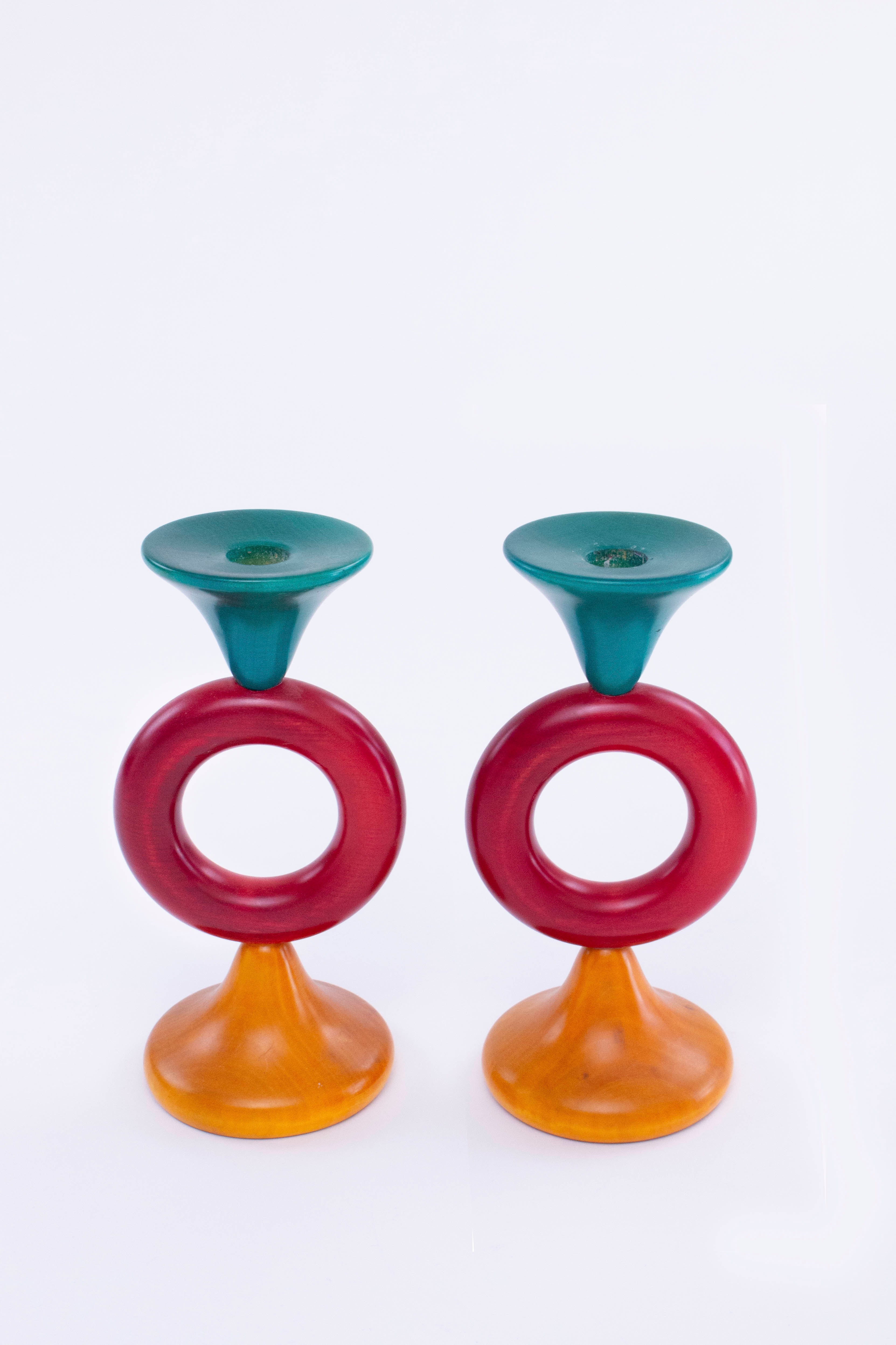 Colorful wooden candle sticks. Made by Manzoni.