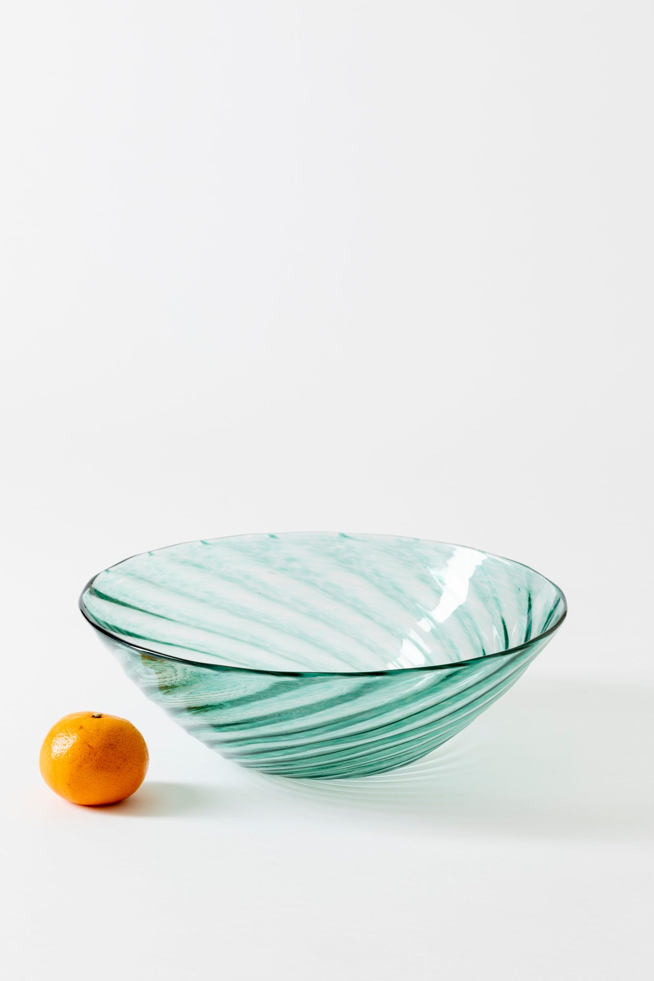 Handblown glass large bowls in variety of colors.