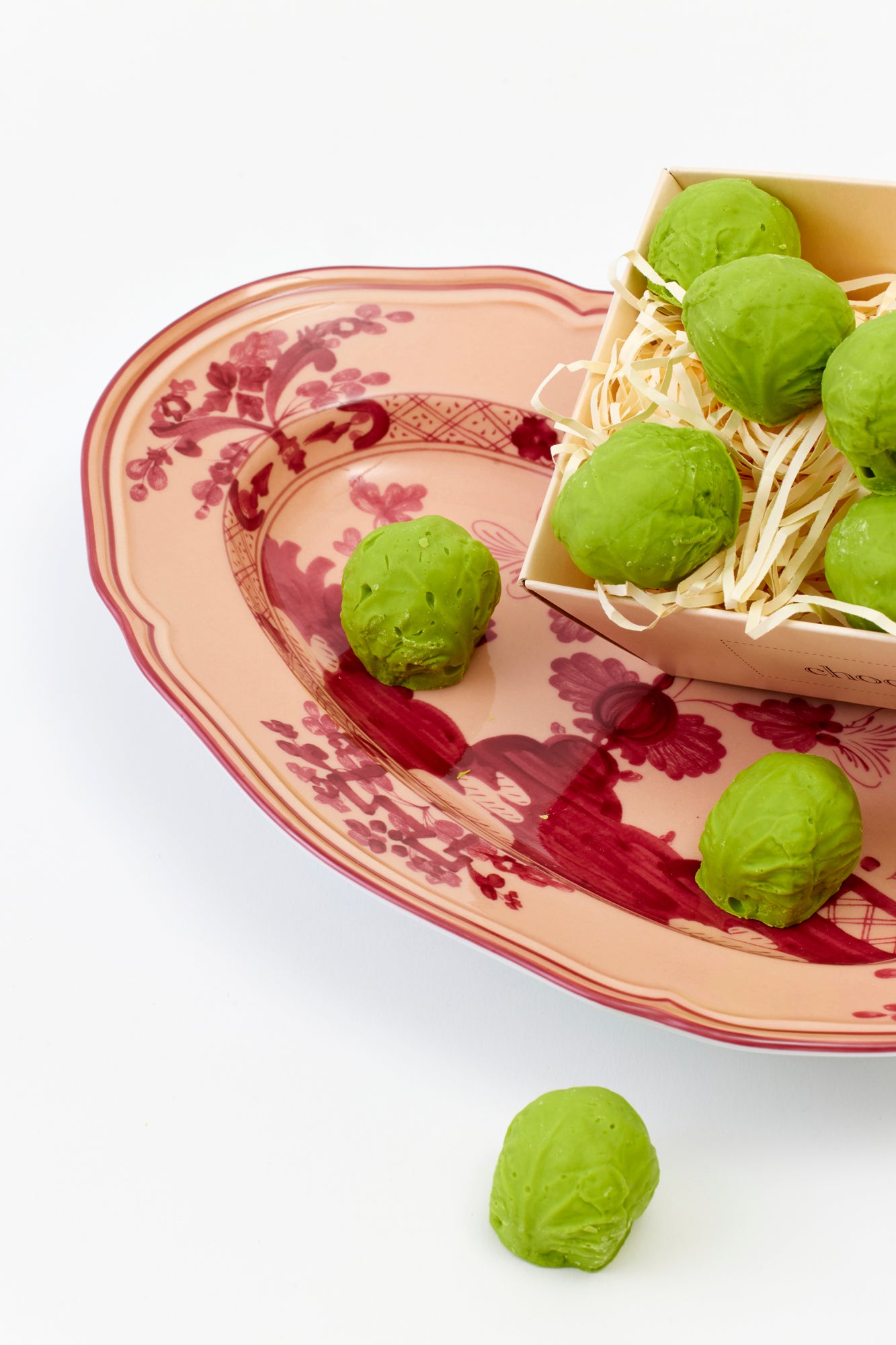 White chocolate shaped like brussels sprouts.