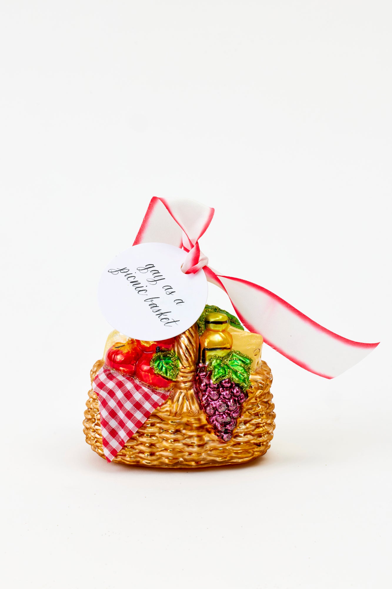 Hand-painted glass ornament shaped like picnic basket with fruits and vegetables, hand crafted in Poland.
