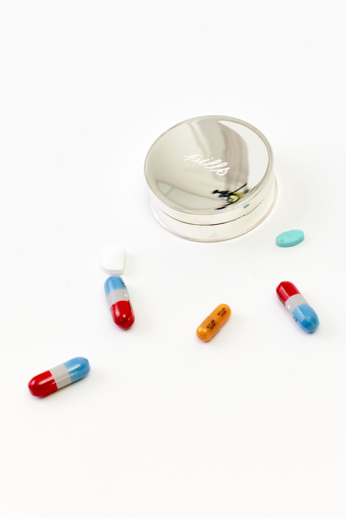 Sterling silver pill boxes.