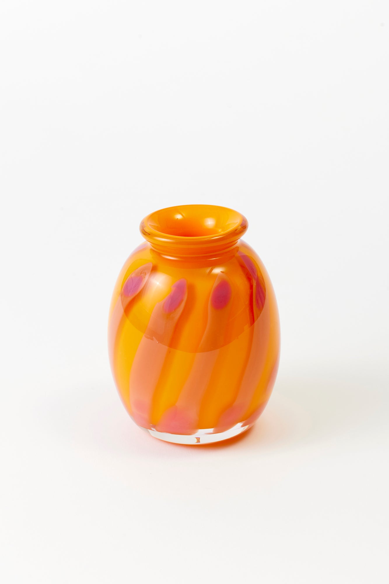 Circus-striped bud vases, designed and hand-blown by Paul Arnhold.