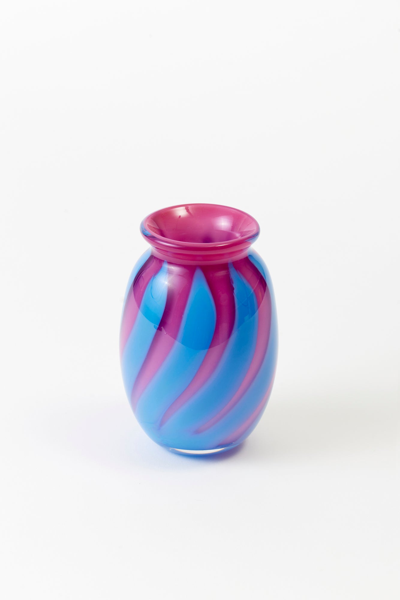 Circus-striped bud vases, designed and hand-blown by Paul Arnhold.