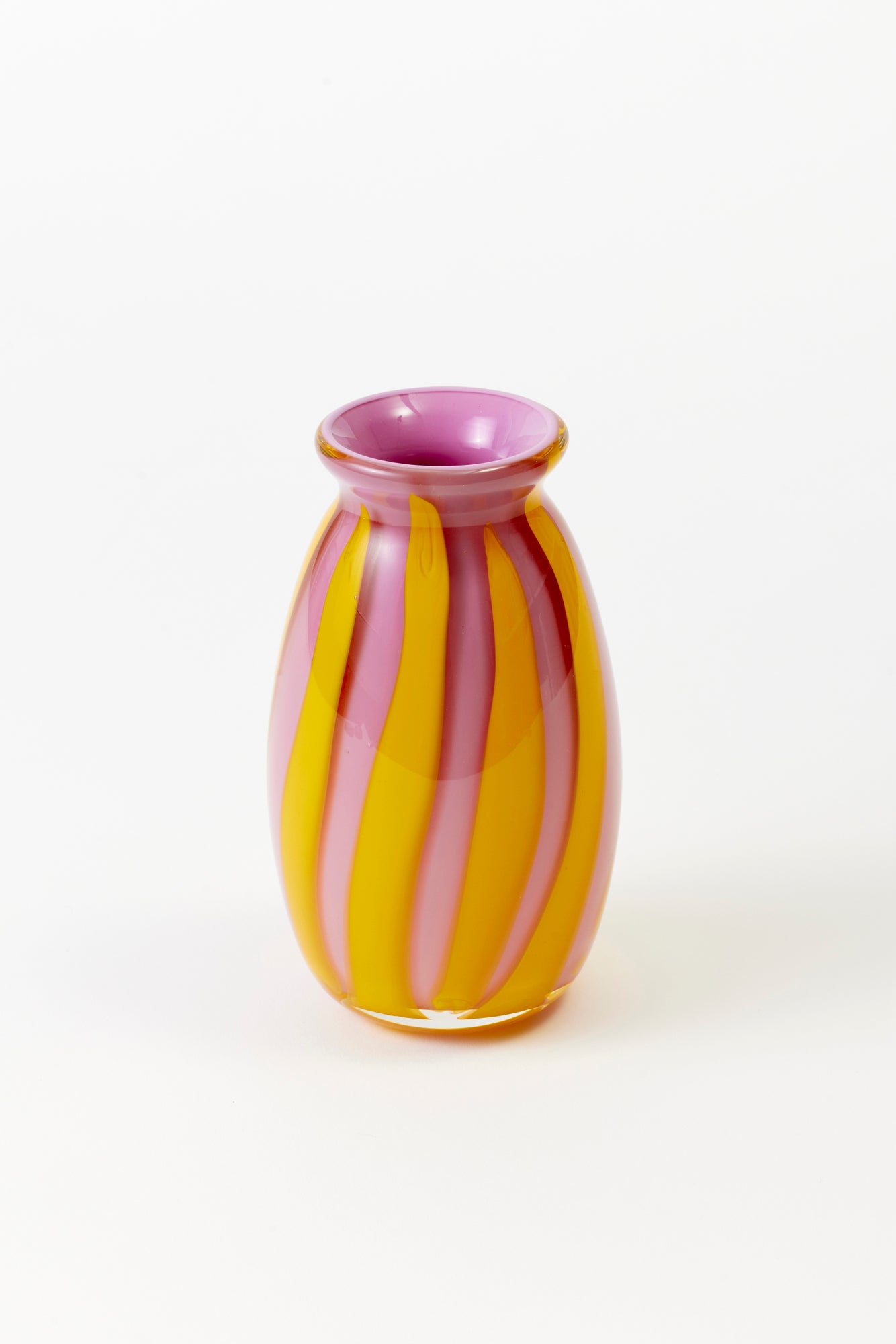 Circus-striped bud vases, designed and hand-blown by Paul Arnhold.