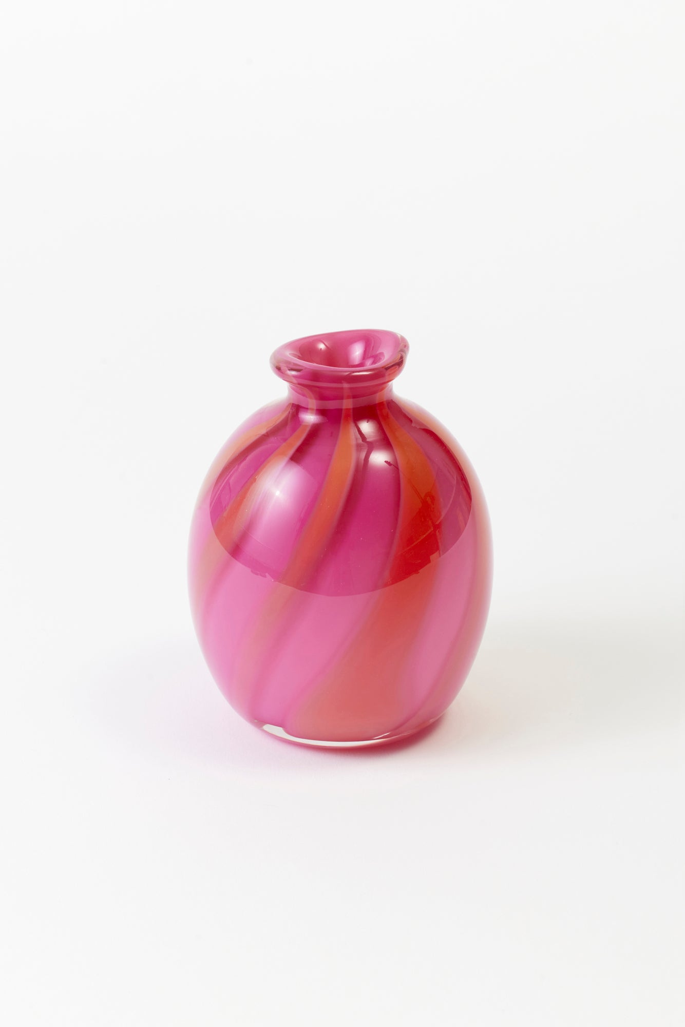 Circus-striped bud vases, designed and hand-blown by Paul Arnhold.