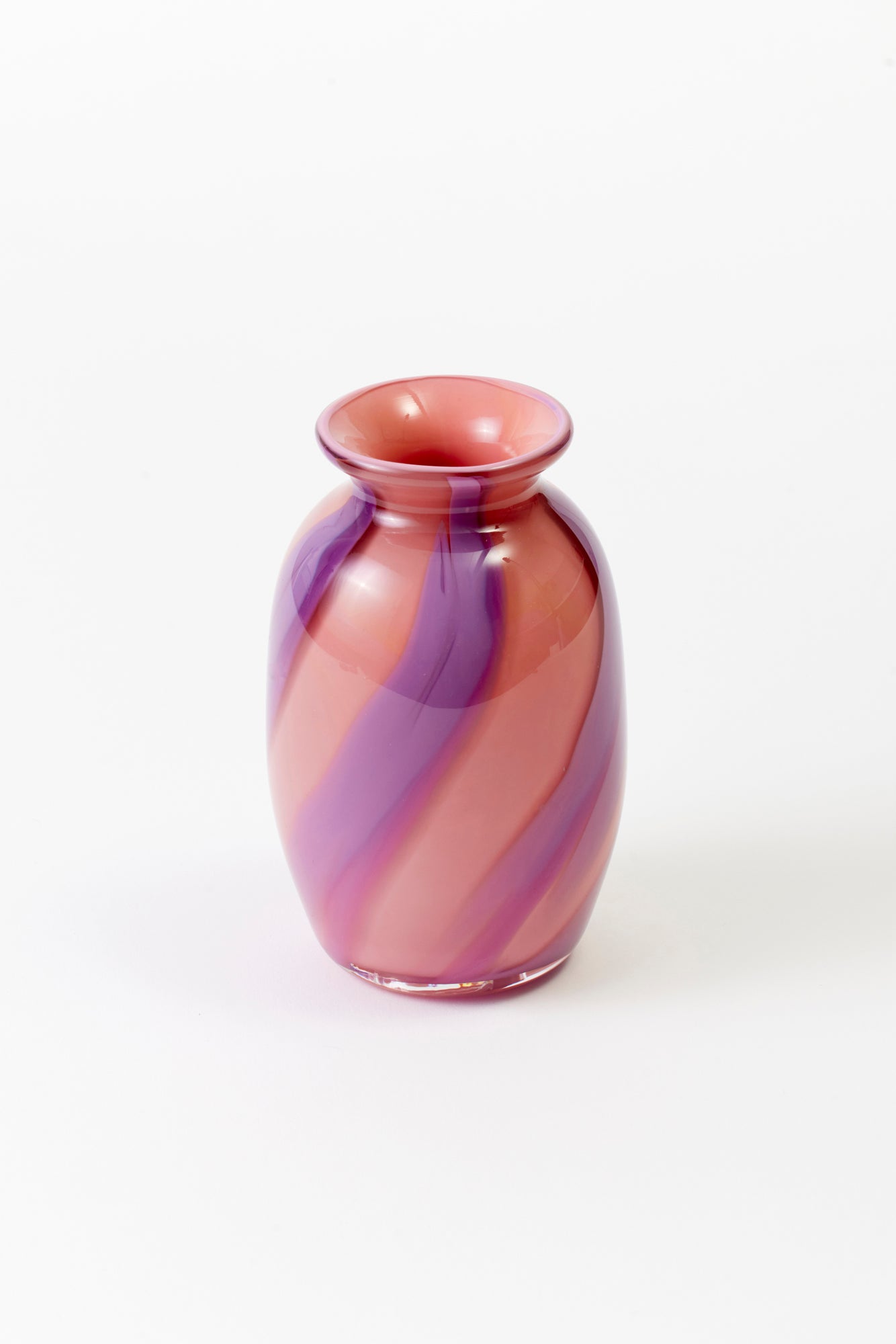 Circus-striped bud vases, designed and hand-blown by Paul Arnhold.
