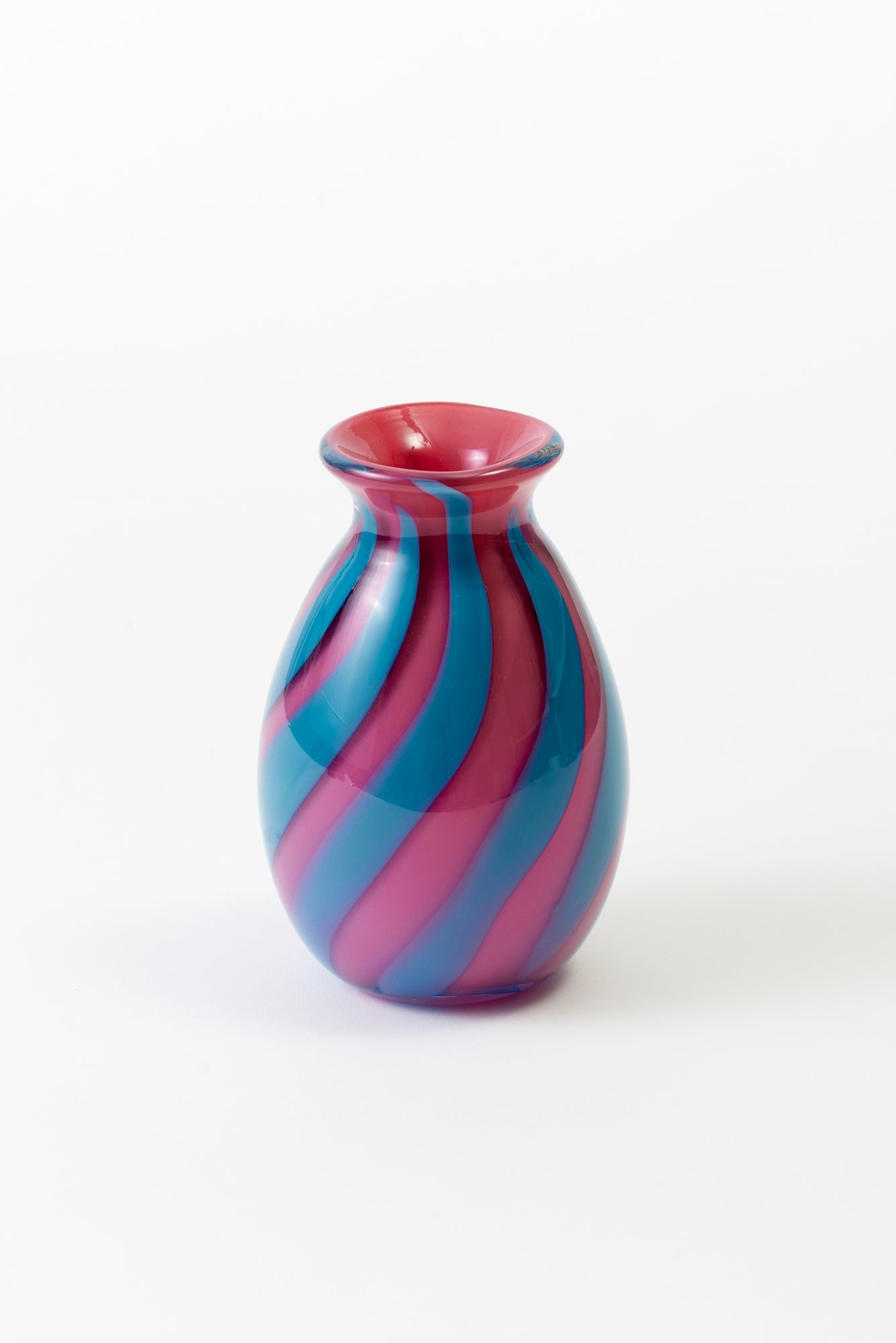 Circus-striped bud vases, designed and hand-blown by Paul Arnhold.