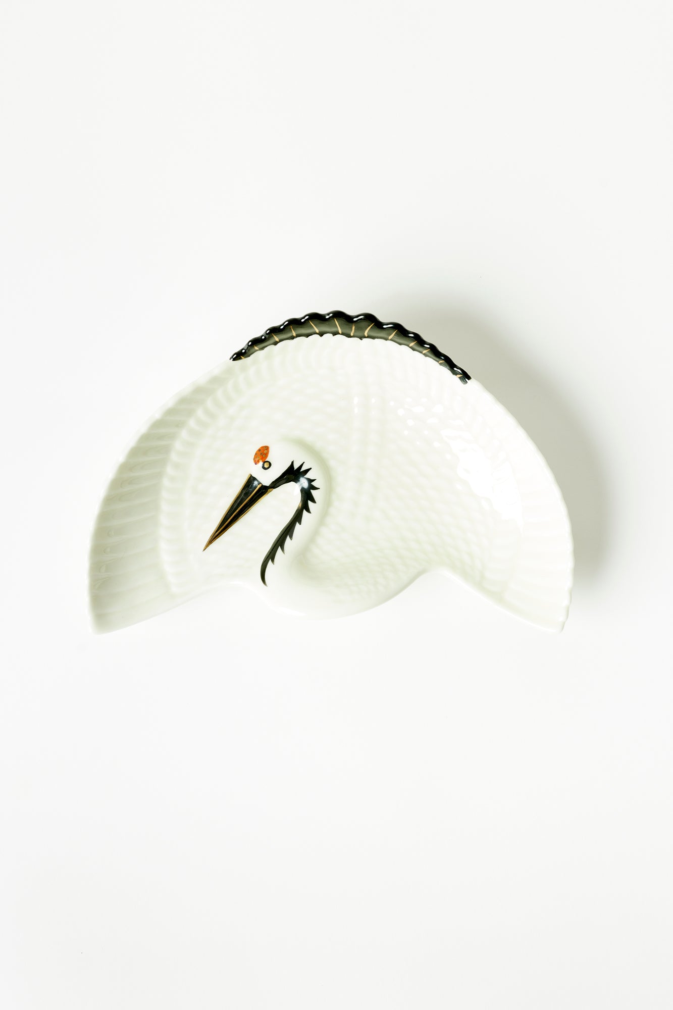 Japanese folklore serving dish with a crane, “Tsuru” is a strong majestic bird.