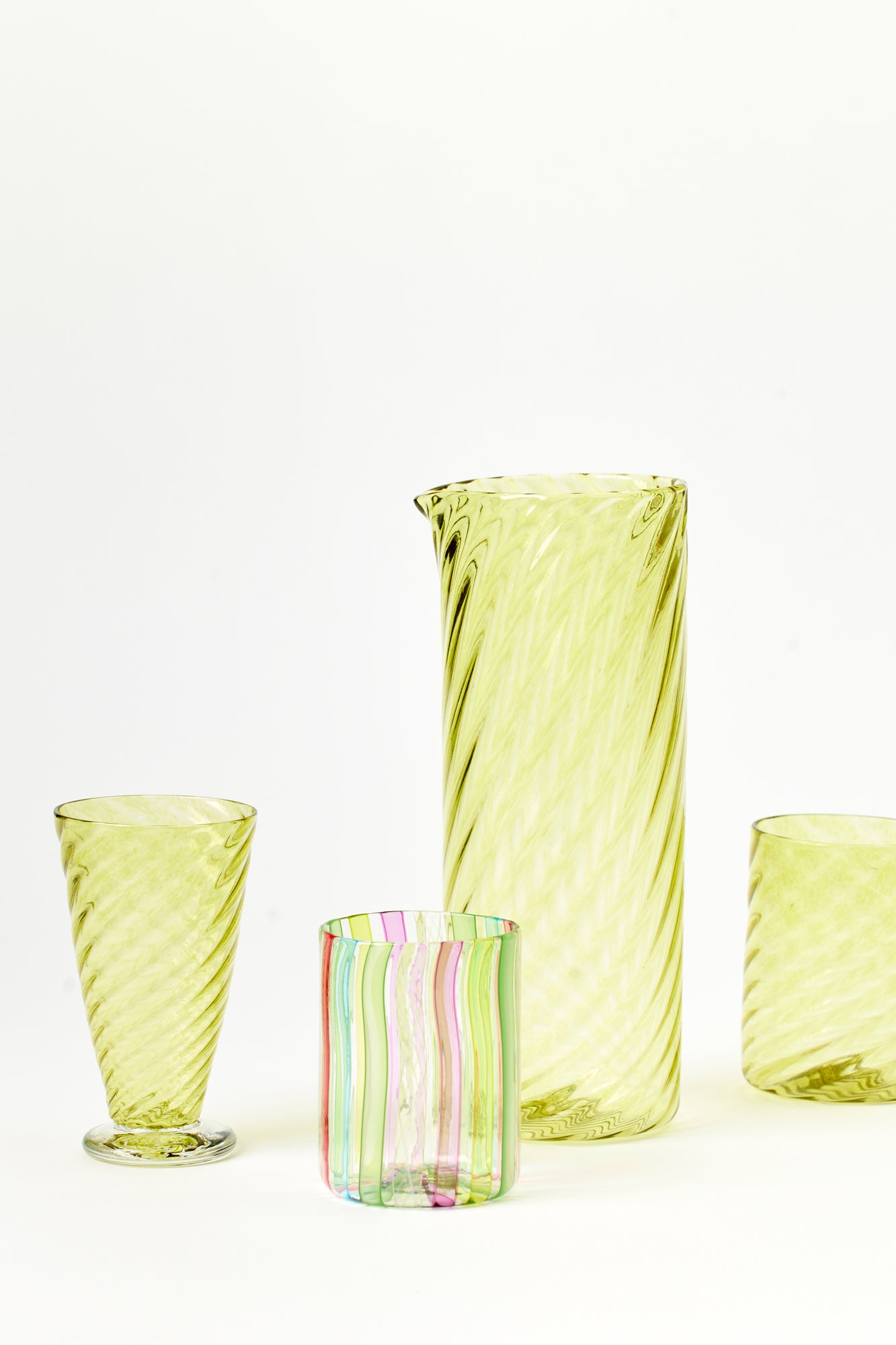 Chartreuse twisted glass tumbler handblown by Tracy Glover.