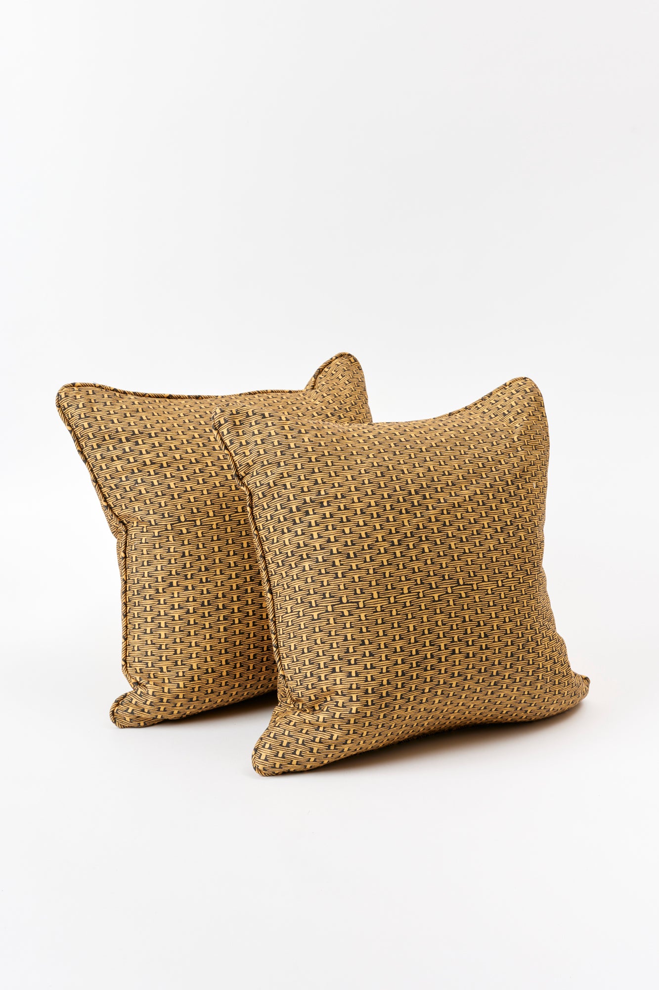 Pair of pillows with woven design and printed in France by Antoinette Poisson, the historic wallpaper restorer.