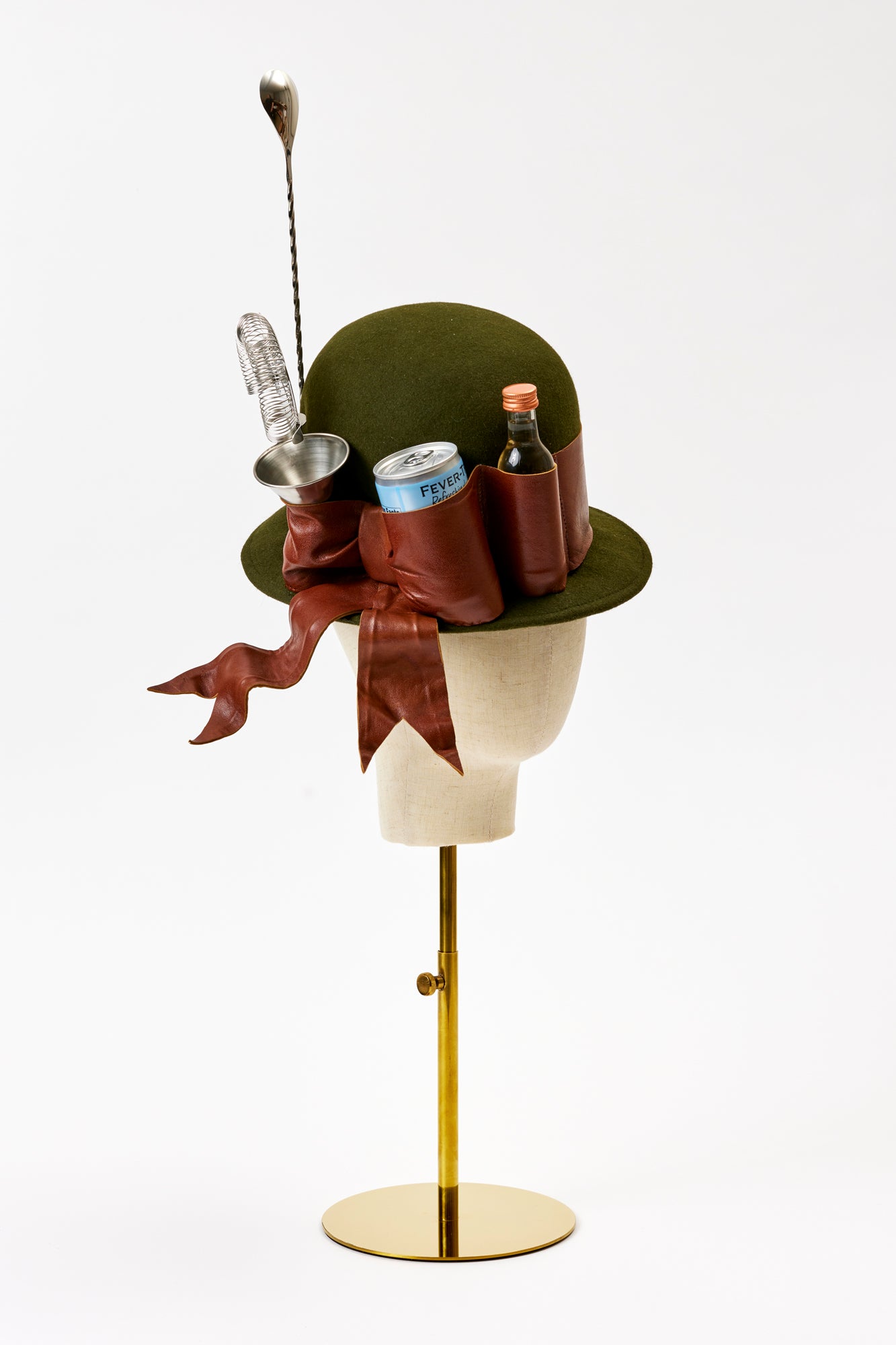 Handmade hat with shot glass, cocktail stirrer, and vodka bottle.