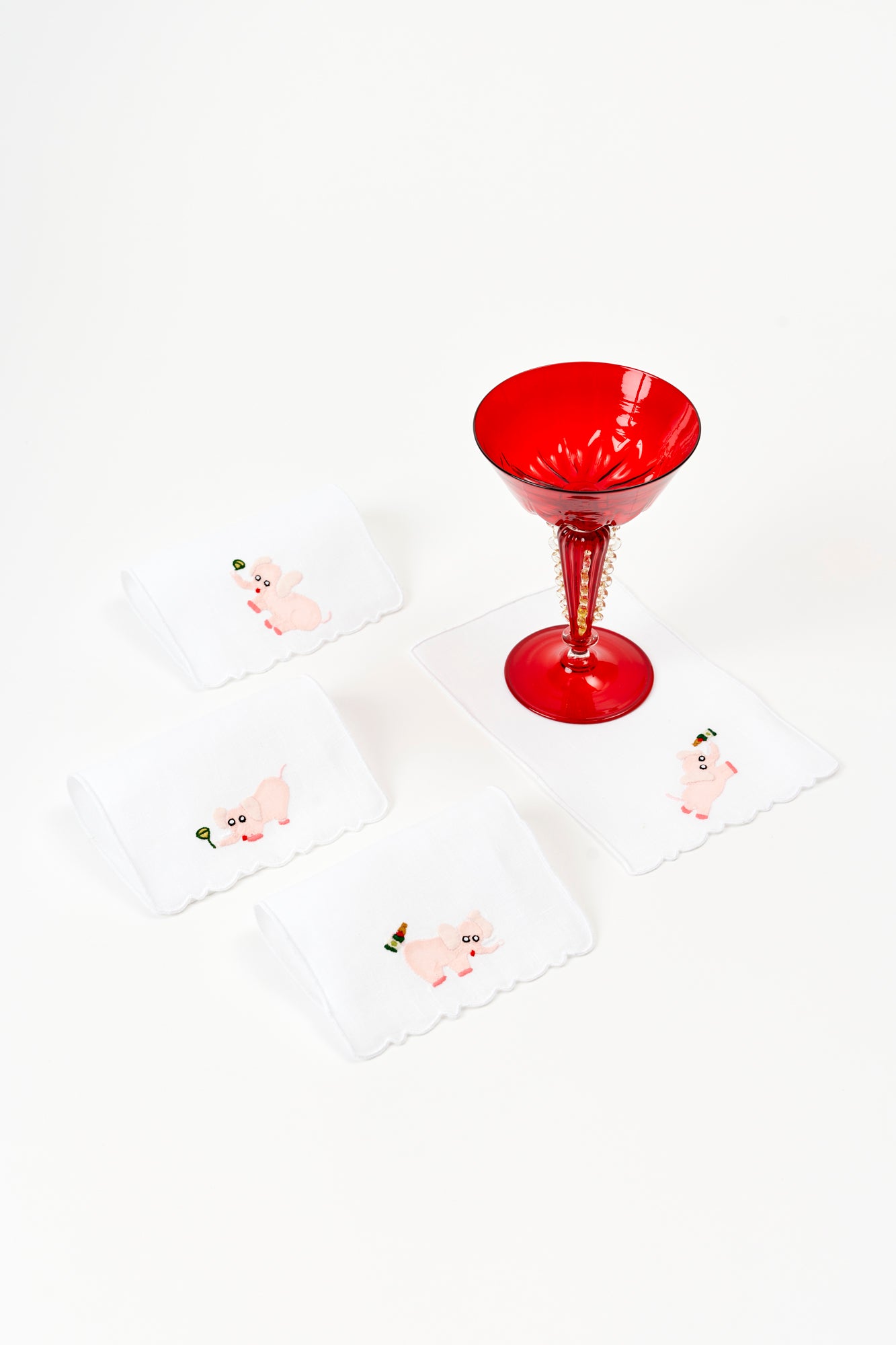 Set of pink elephant with champagne cocktail napkins.