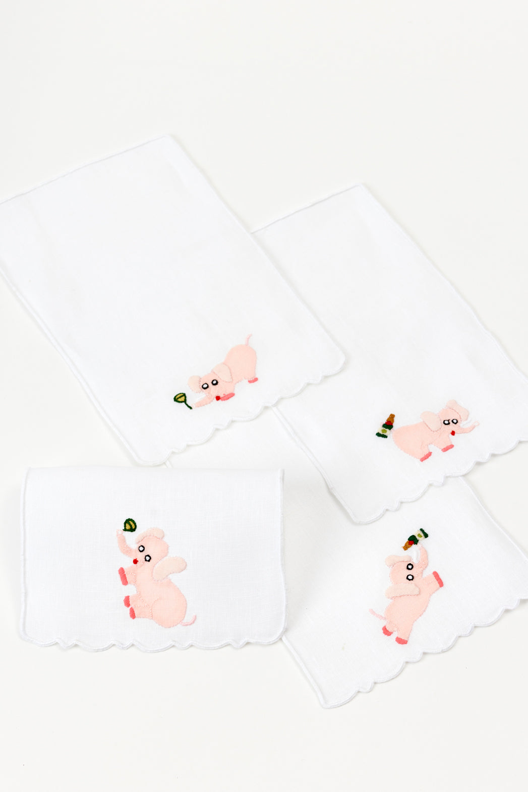 Set of pink elephant with champagne cocktail napkins.
