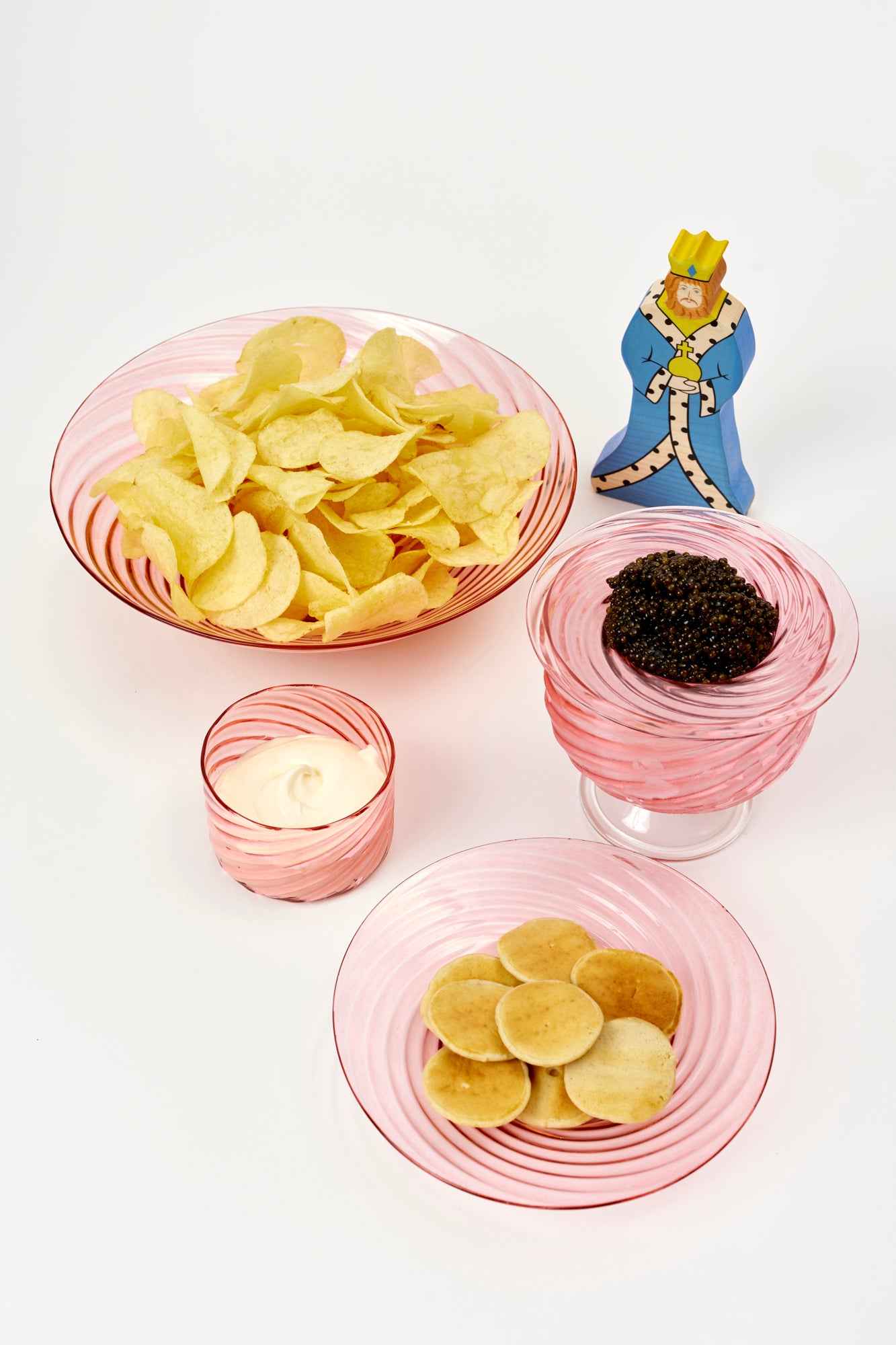 These lovingly handcrafted maple and beechwood figurines of royal king, queen and dragon.