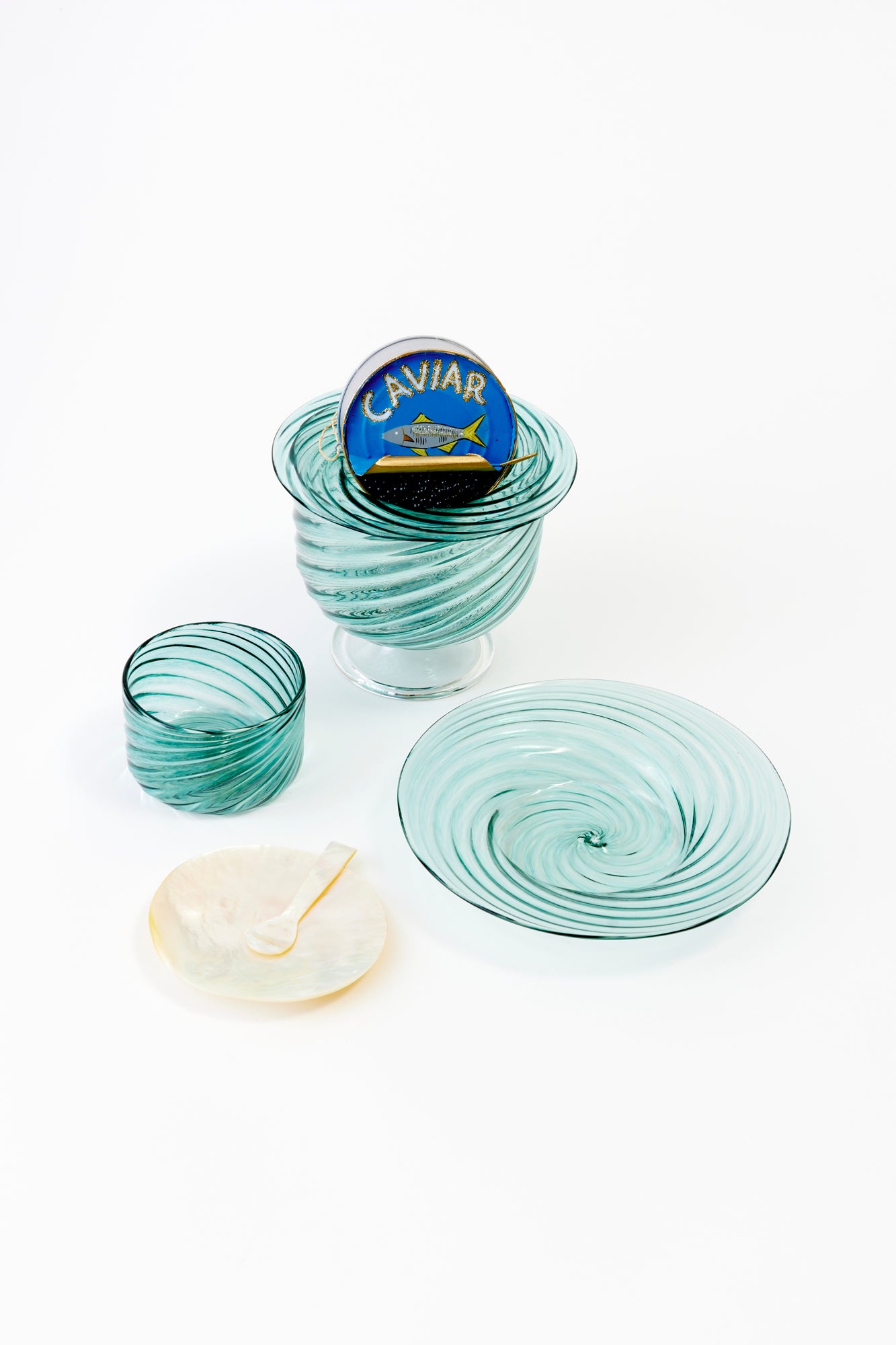 Artisanal twisted glass caviar service in Turquoise, handblown by Tracy Glover in her Rhode Island studio.