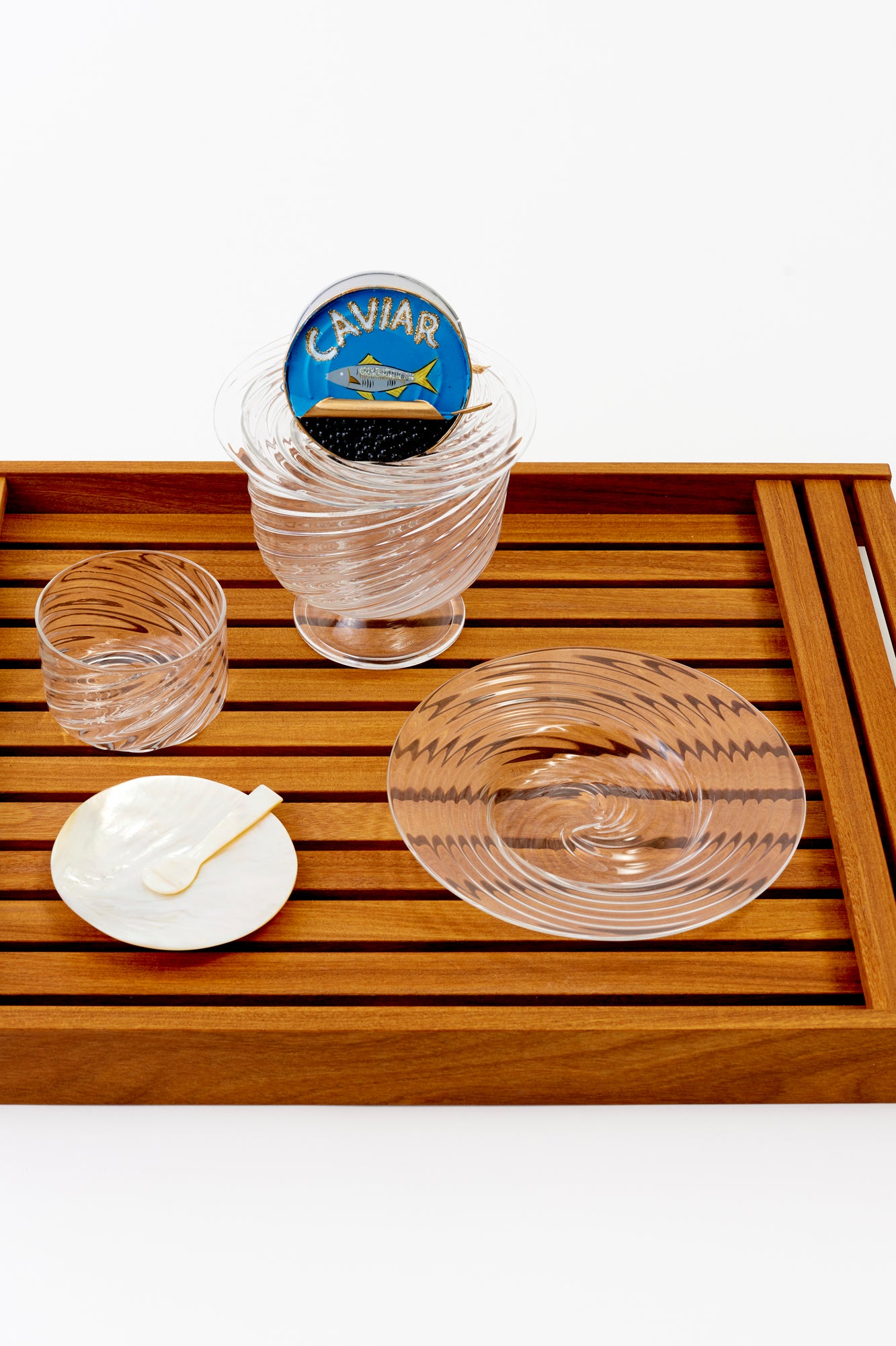 Artisanal twisted glass caviar service in clear, handblown by Tracy Glover in her Rhode Island studio.
