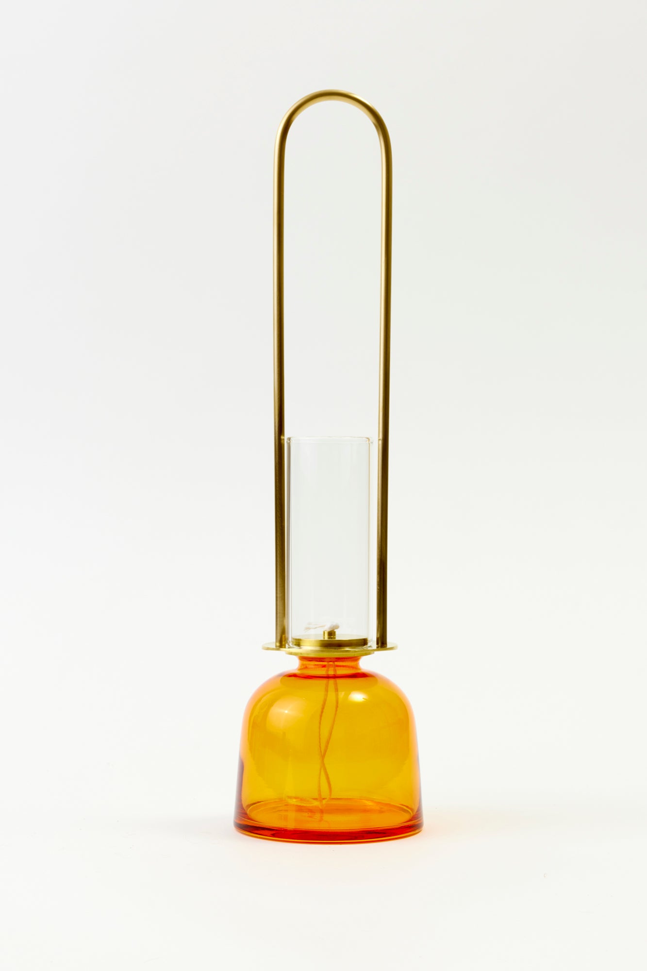 Japanese oil lantern with amber glass.