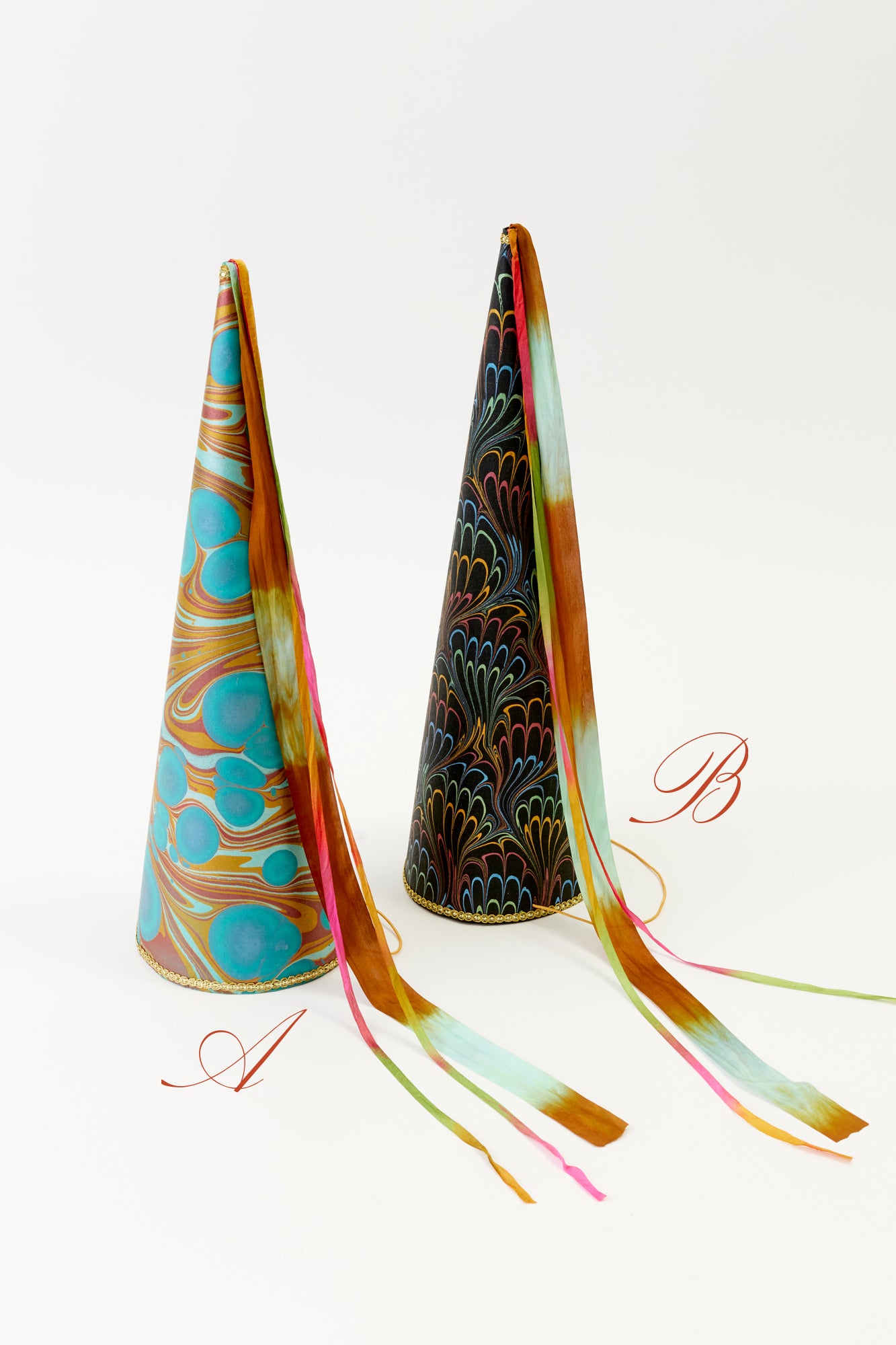 Tall marbled paper hennin hat.