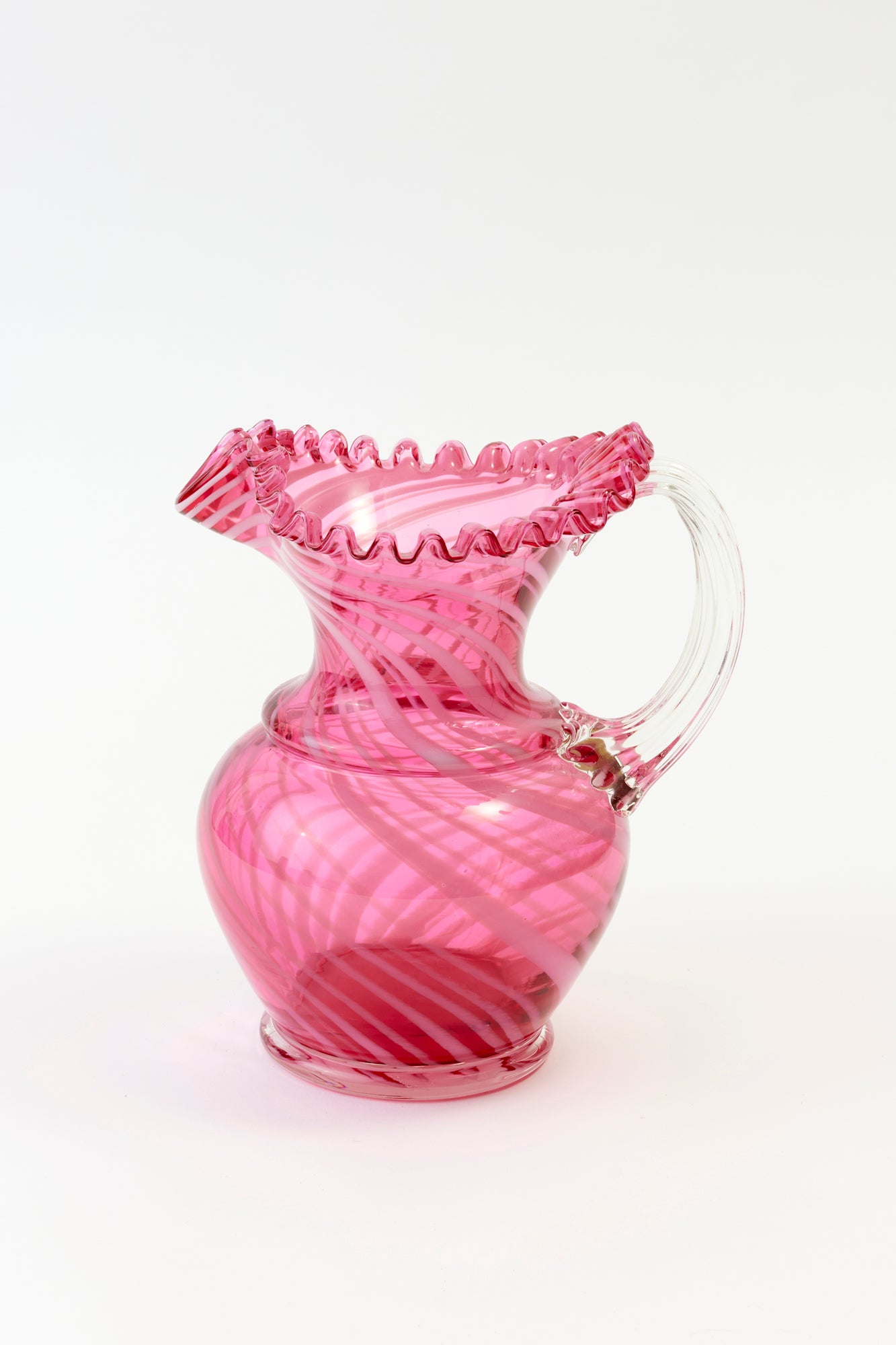 Vintage playful pink pitcher with ruffles.