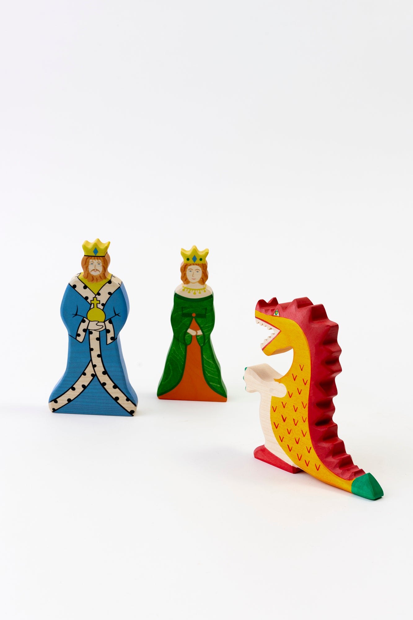 These lovingly handcrafted maple and beechwood figurines of royal king, queen and dragon.