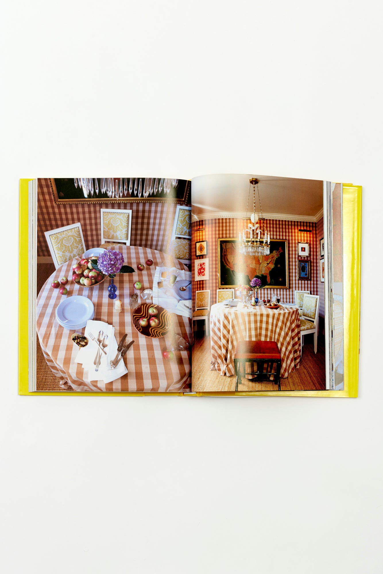 In 'Defining Luxury,' Jeffrey Bilhuber urges readers to embrace and appreciate luxury in its many forms, whether it be the comfort of a perfectly tufted reading chair, the elegance of heirloom vases cradling fresh garden roses, or the magic of a dazzling chandelier casting enchanting light.