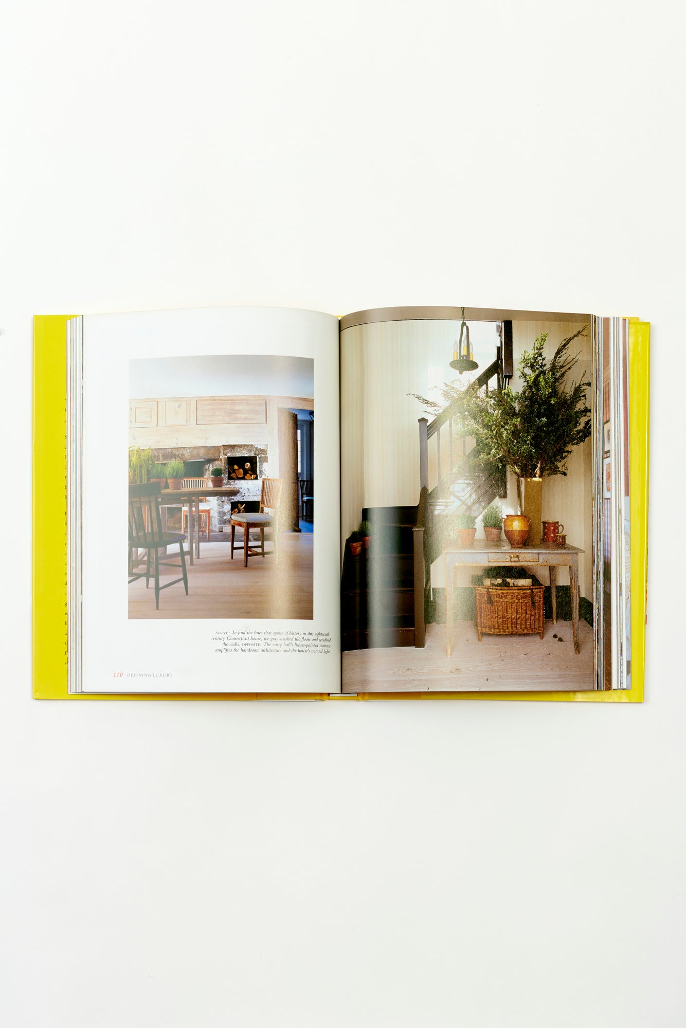 In 'Defining Luxury,' Jeffrey Bilhuber urges readers to embrace and appreciate luxury in its many forms, whether it be the comfort of a perfectly tufted reading chair, the elegance of heirloom vases cradling fresh garden roses, or the magic of a dazzling chandelier casting enchanting light.