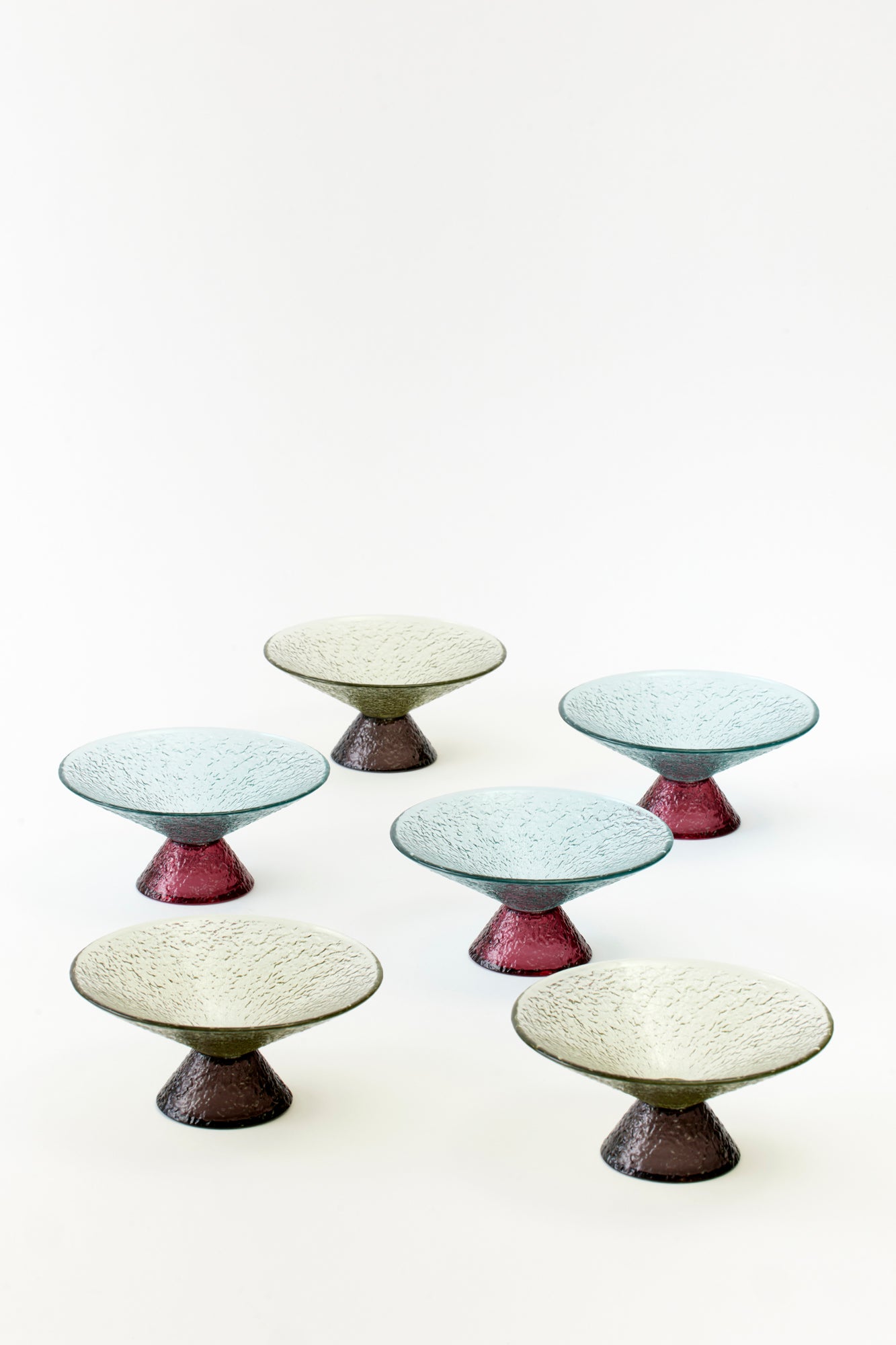 A craquelle texture lends charm to this set of six vintage-feeling dessert compotes.