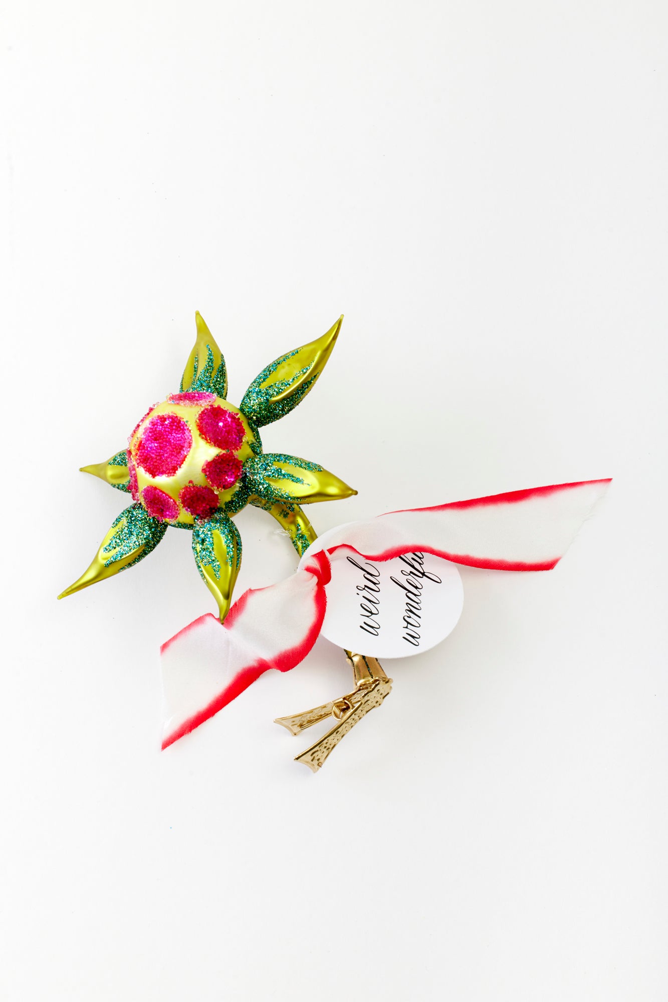 Hand-painted glass ornament shaped like flower crafted in Poland.