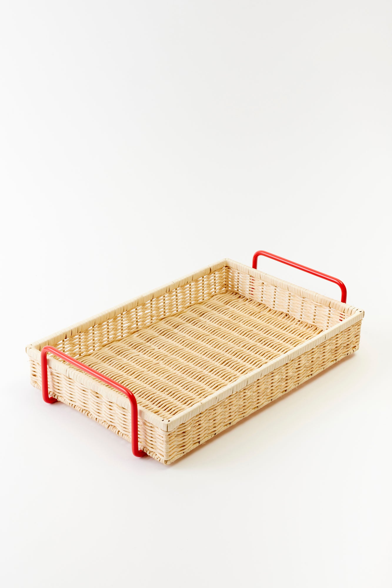 Versatile wicker serving tray with striking red handles, perfect for serving beverages, snacks, or stylishly organizing a coffee table.