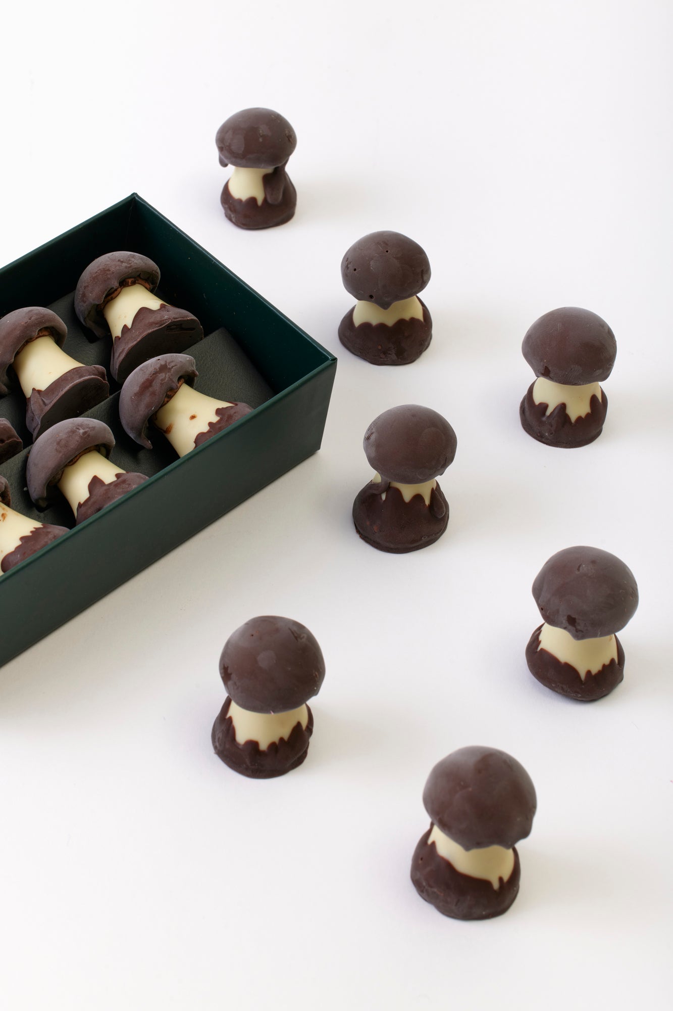 Gourmet chocolate mushrooms made by French chocolatier. Filled with a dreamy butterscotch caramel base and pure almond nougatine cap.
