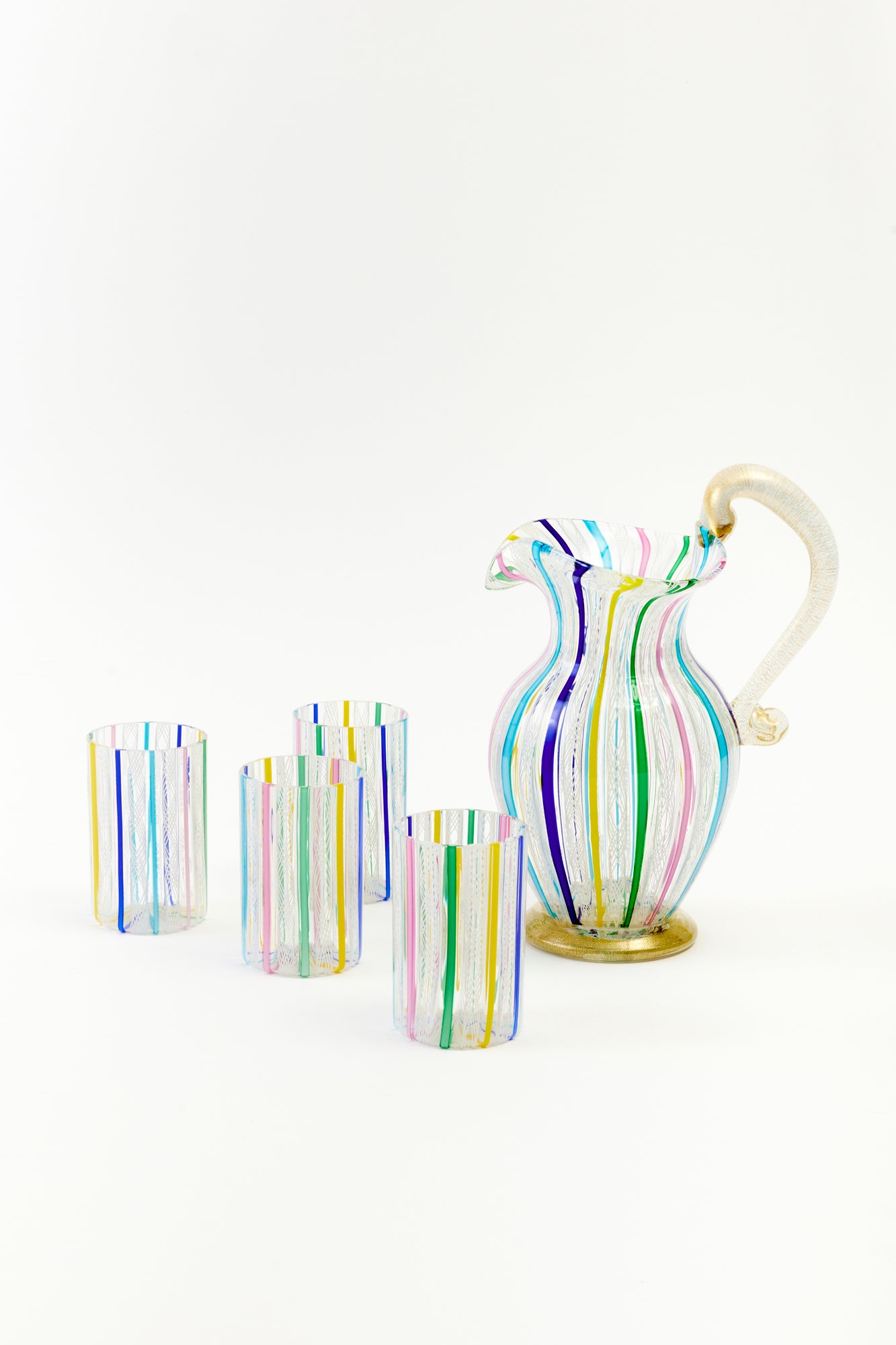 Striped colorful vintage latticino pitcher and tumbler.