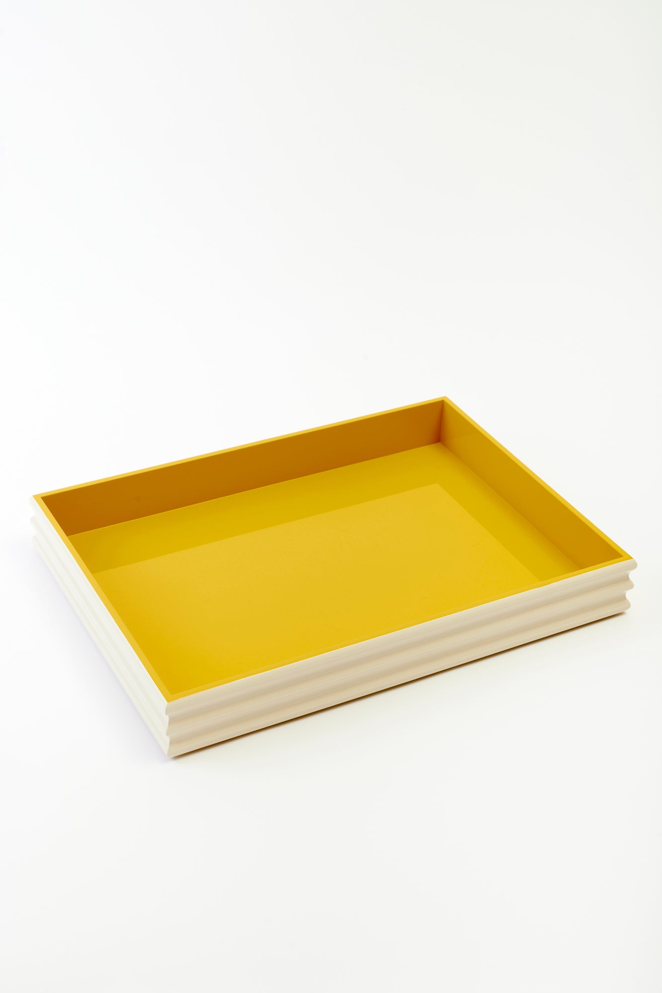 Yellow lacquered tray.