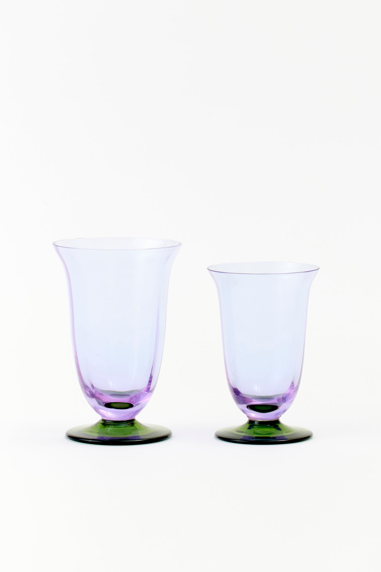 Purple and green glass water and wine glass.