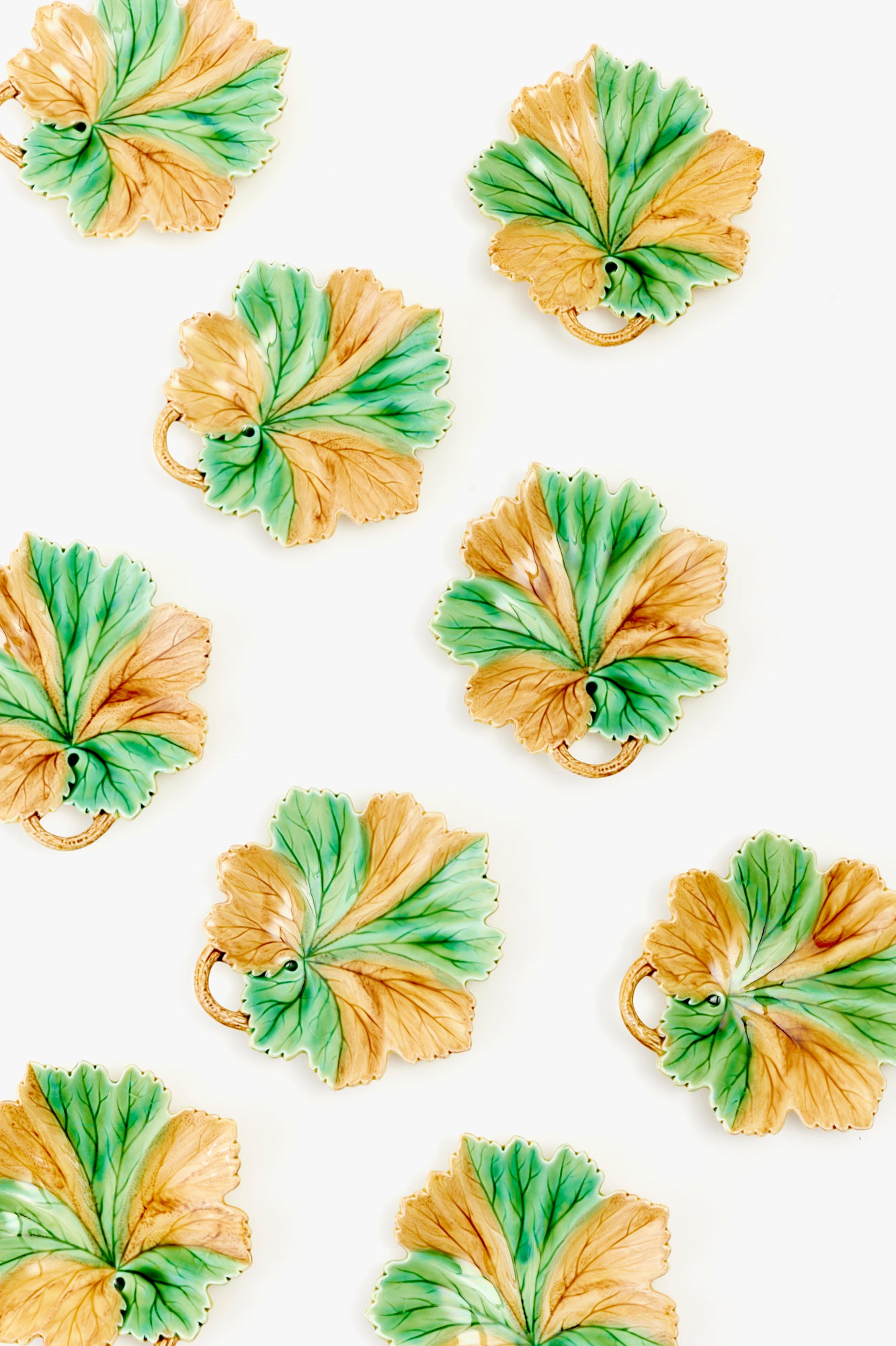 Leaf-shaped majolica plates are perfect for serving a crisp garden salad or a raspberry tart.