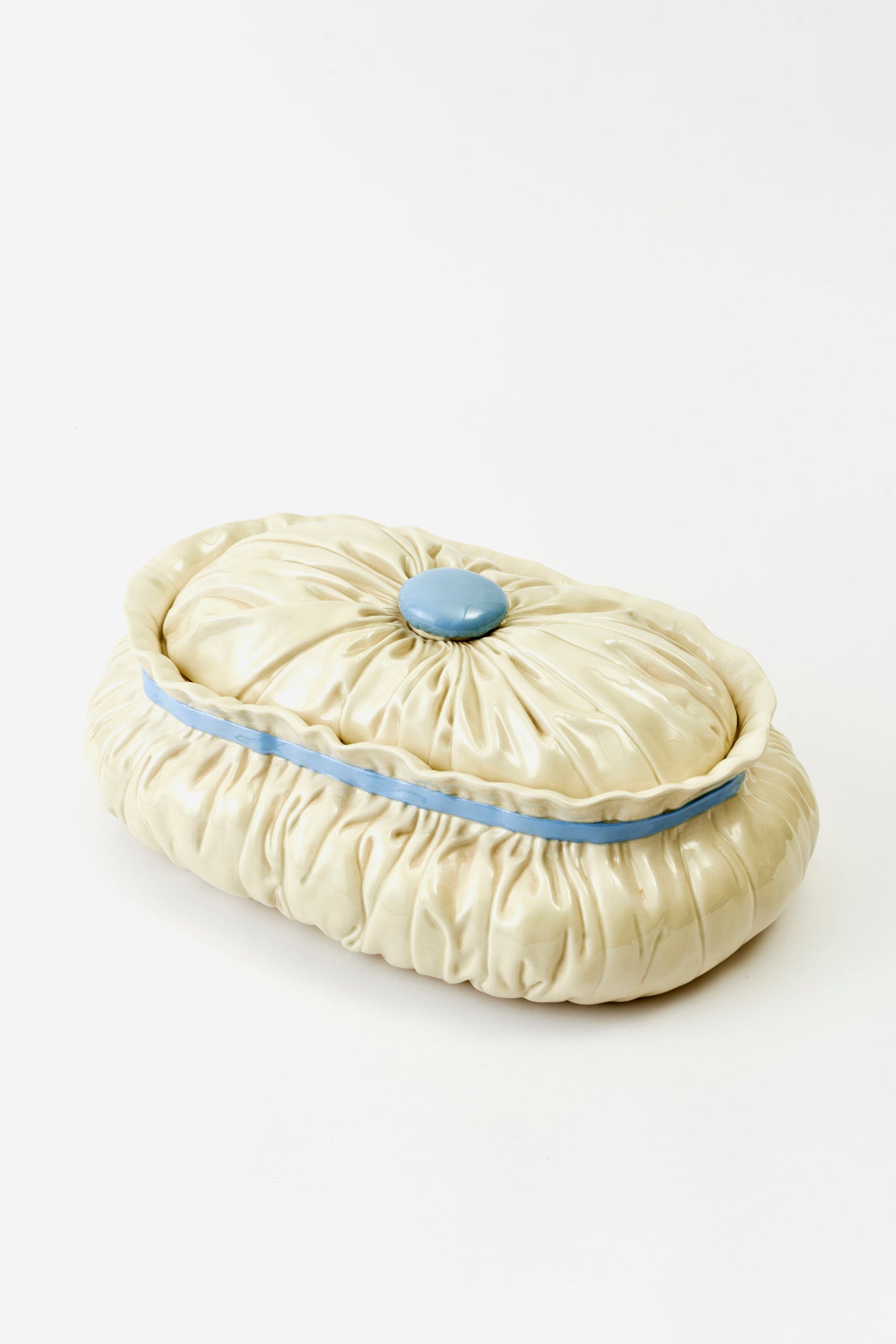 Vintage trompe l'oeil tureen that resembles fabric.
