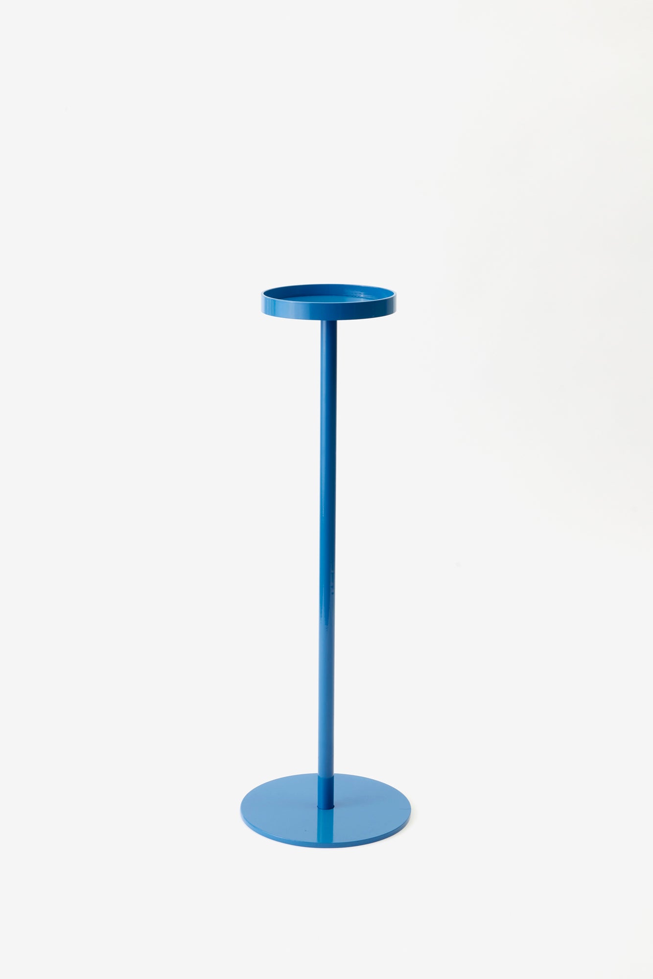 The perfect tiny table for your drink of choice. Eight powder-coated colors.