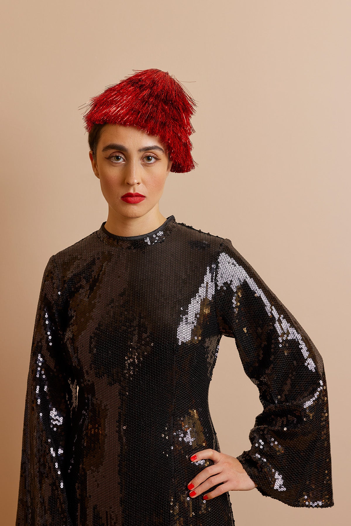 Red tinsel party hat. Perfect for Christmas.