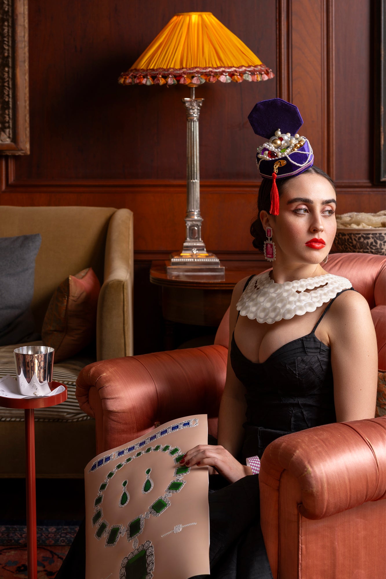 Headband with jewel box that includes pearls and jewels.