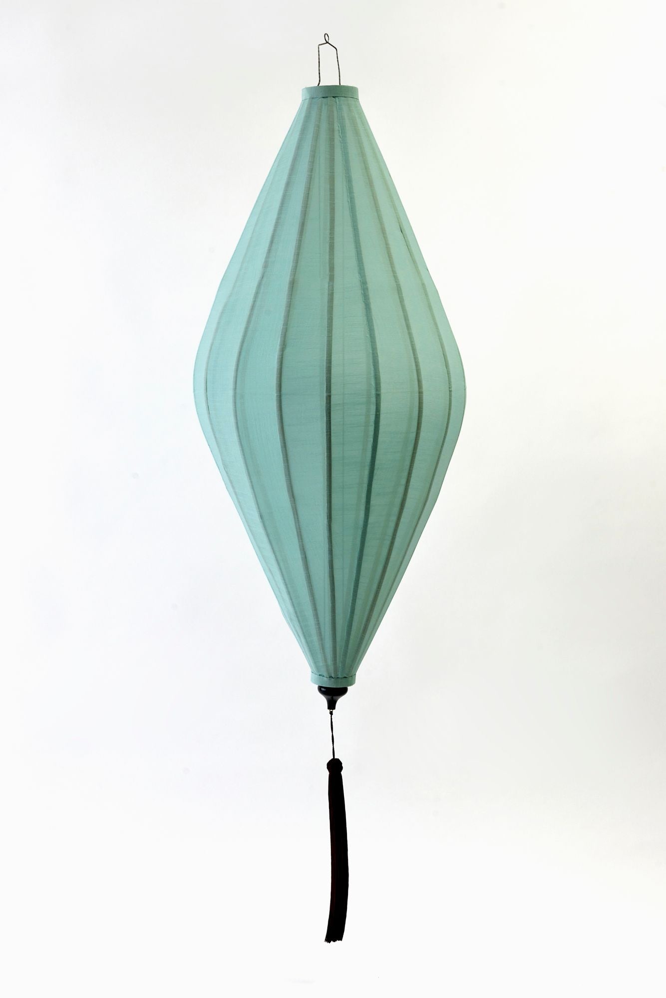 blue lantern on white backdrop