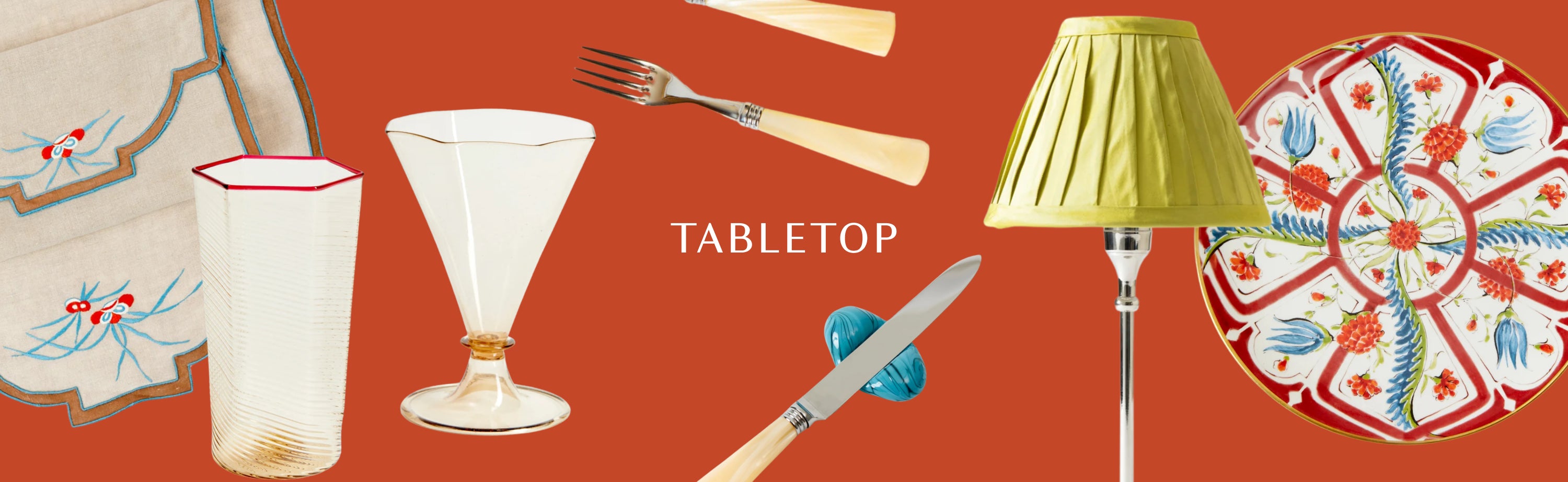 Red banner with various cutouts of tableware products and text that says tabletop.