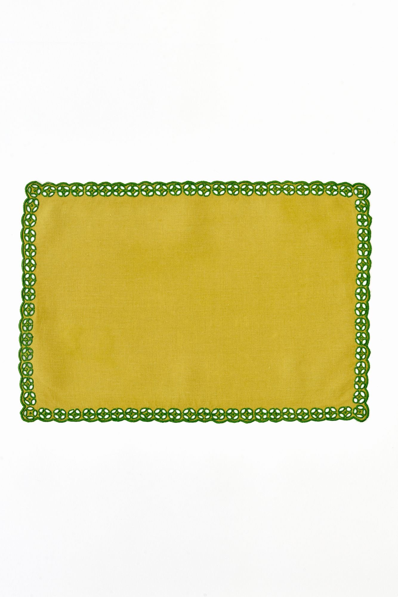 Green placemat with lace detailing