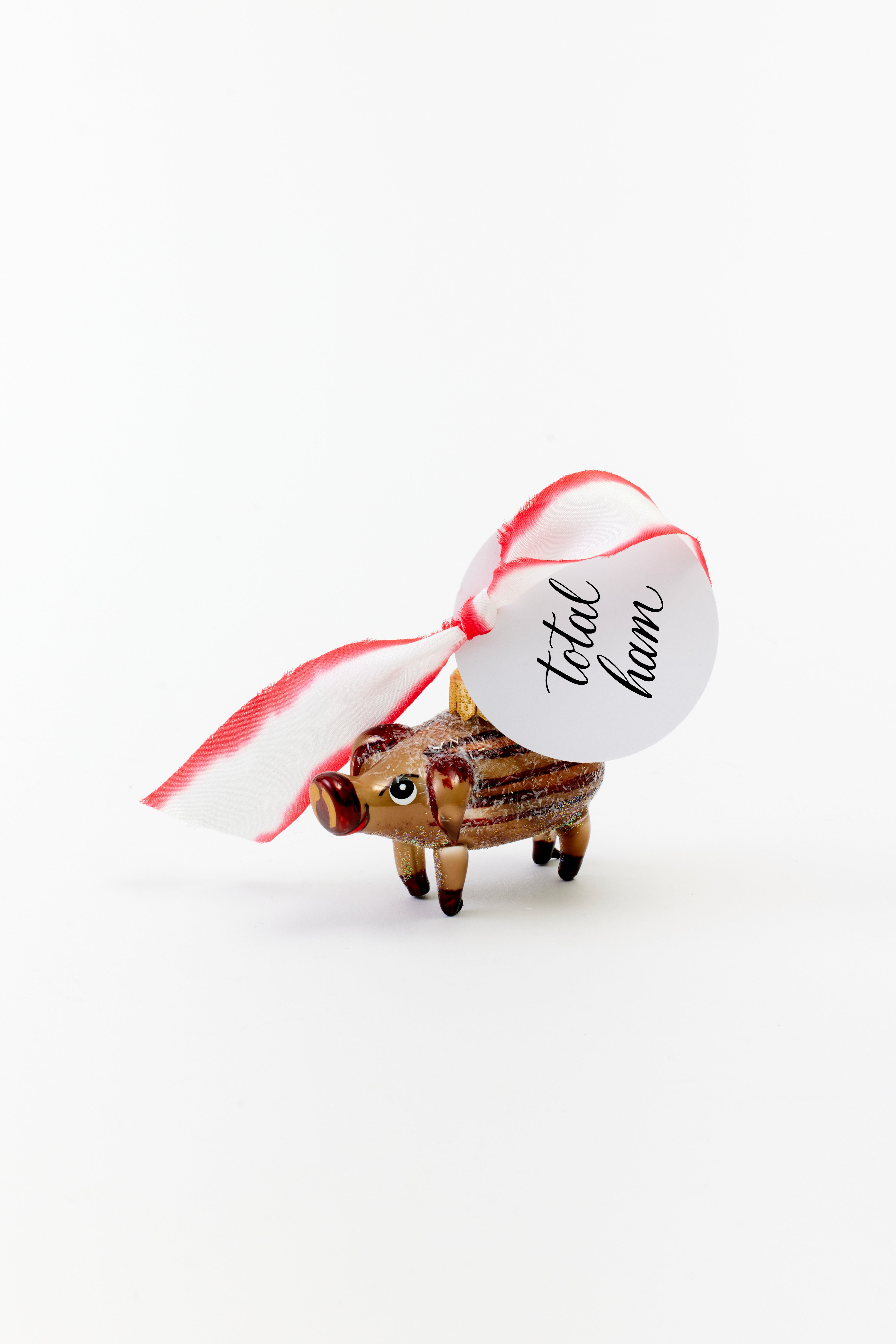 Brown pig glass ornament.