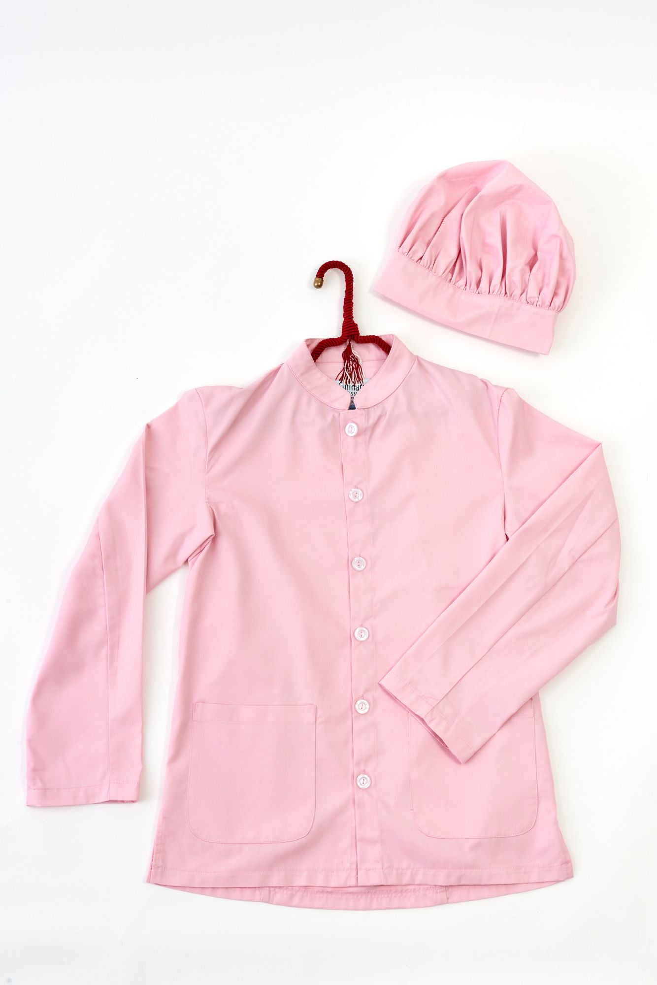 Pink chef's coat and hat on a white background