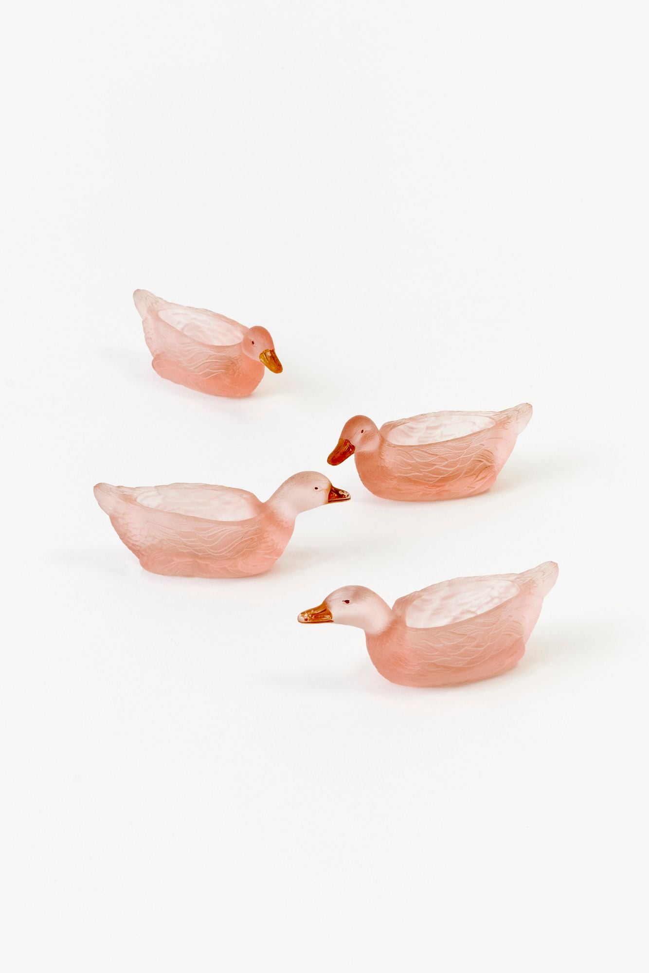 SET OF 4 PINK GLASS DUCK SALTS.