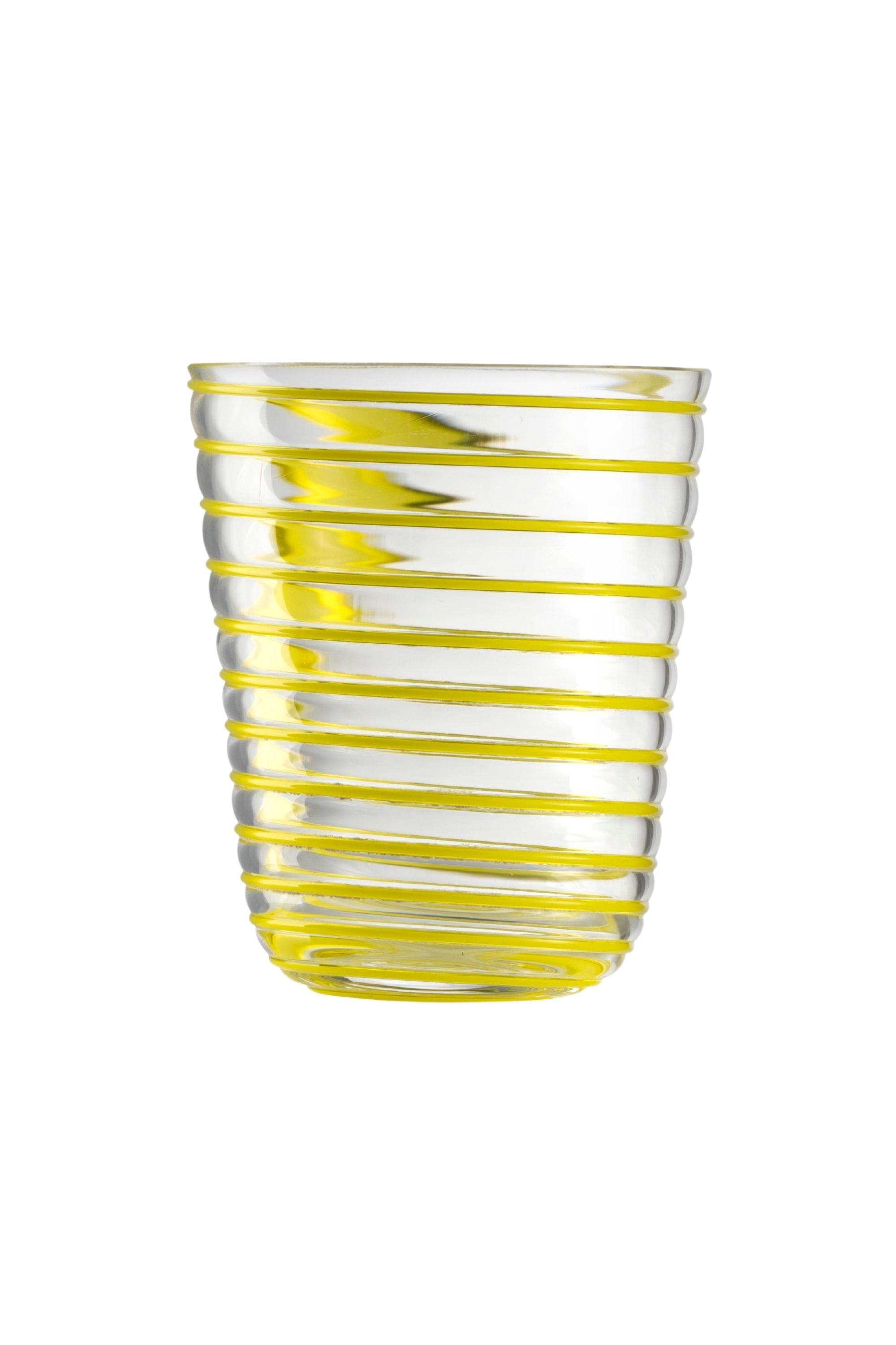 Transparent glass embossed with yellow glass thread spiraling up the cup.